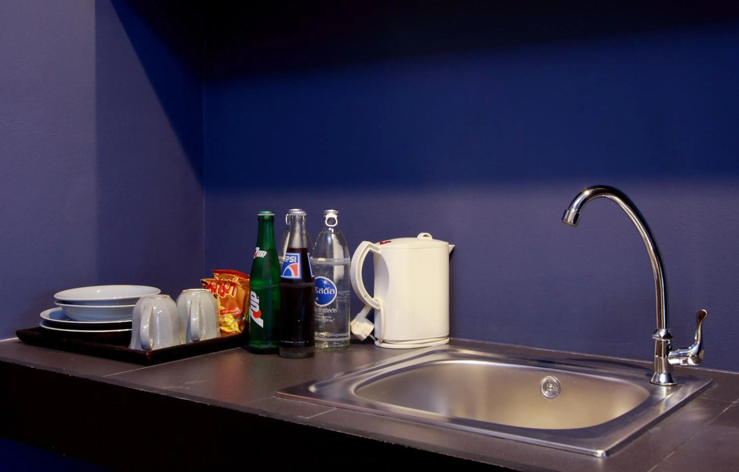 Kitchen or kitchenette in Sino Inn Phuket Hotel - SHA Plus