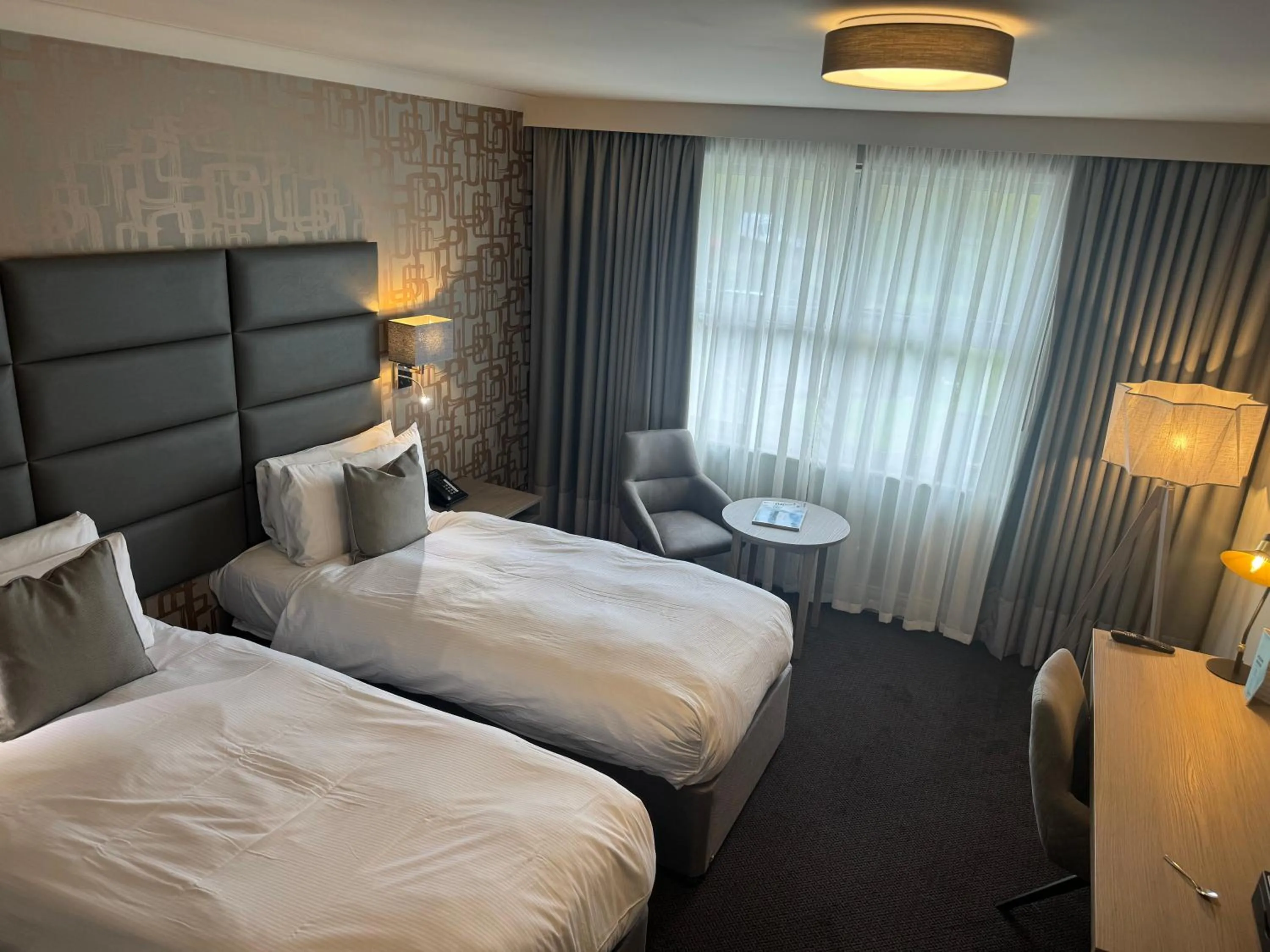 Bed in The Essex Golf & Country Club Hotel