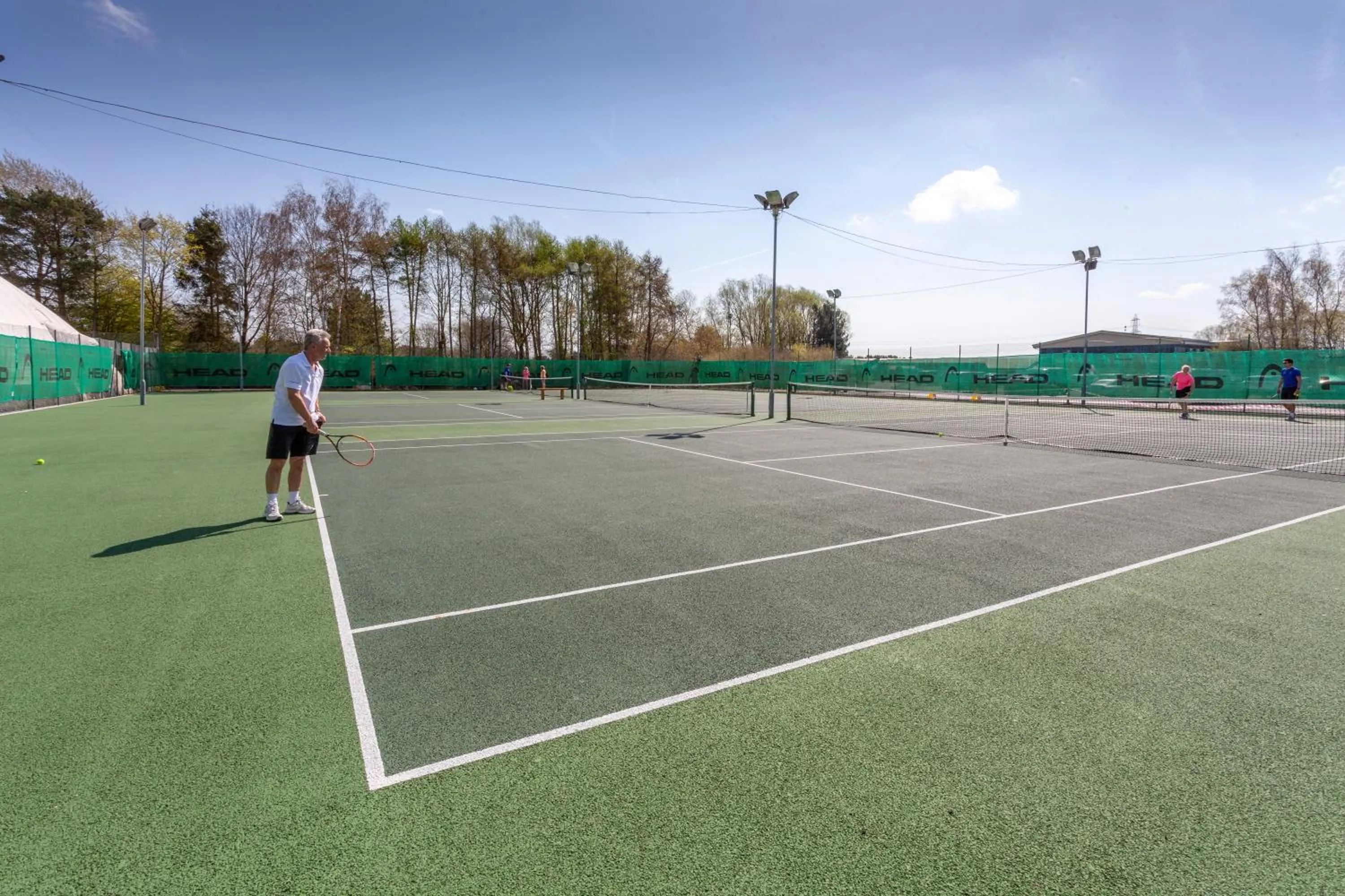 Tennis court in The Essex Golf & Country Club Hotel
