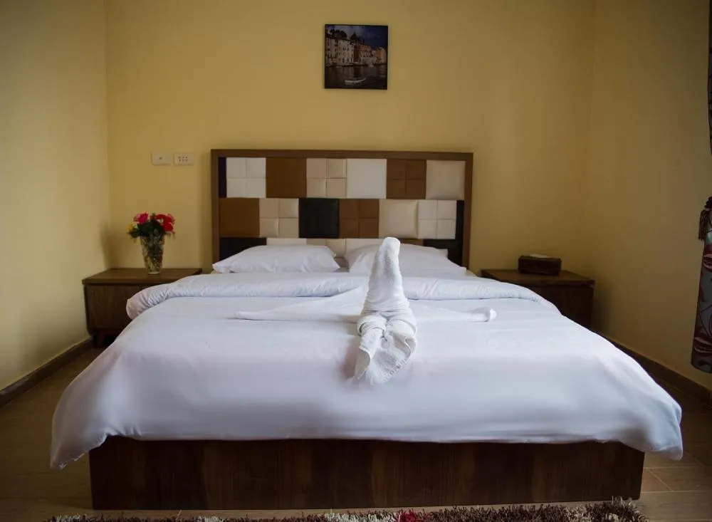 Bed in New Grand Royal Hotel Cairo