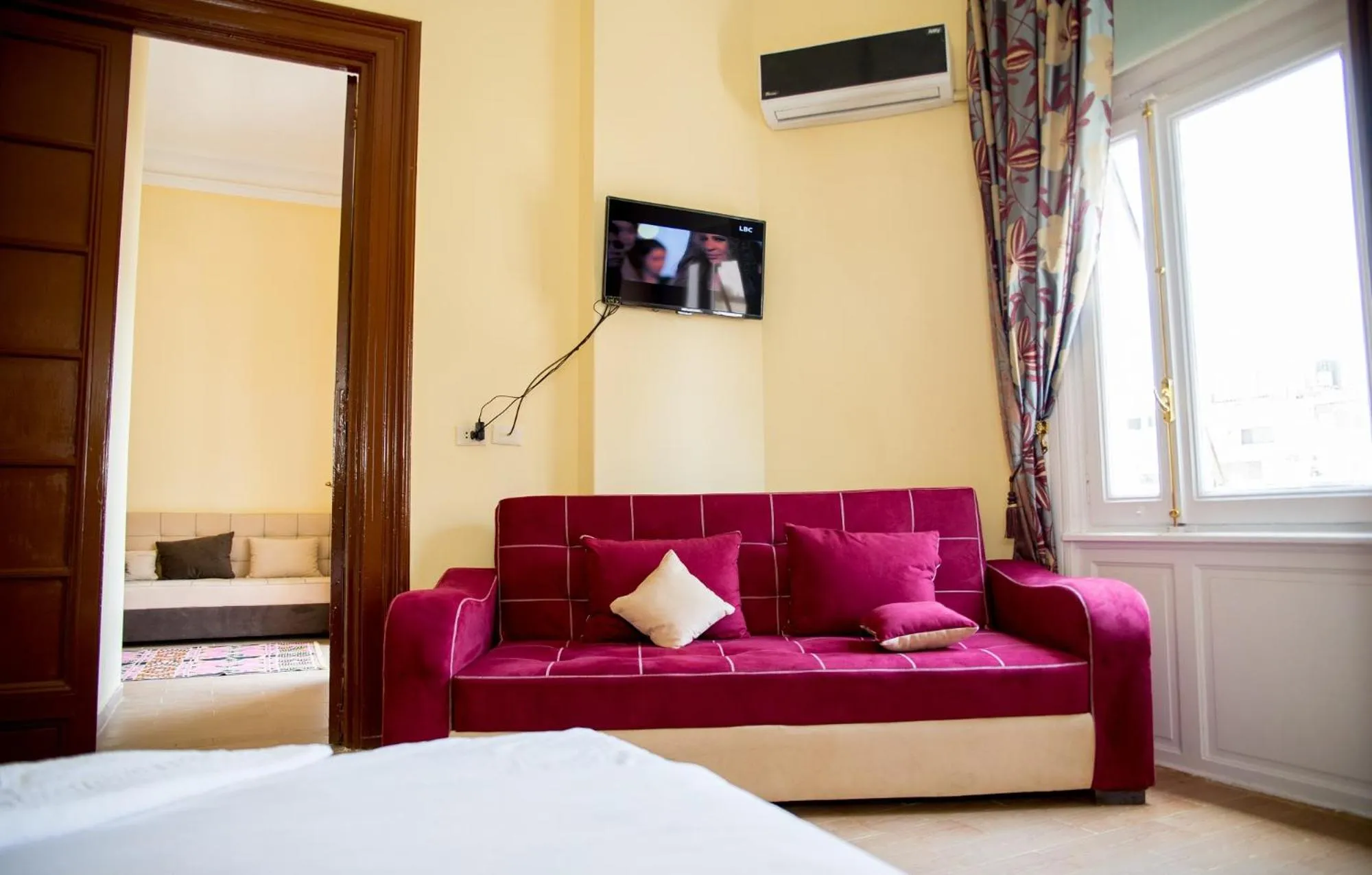 Bed in New Grand Royal Hotel Cairo