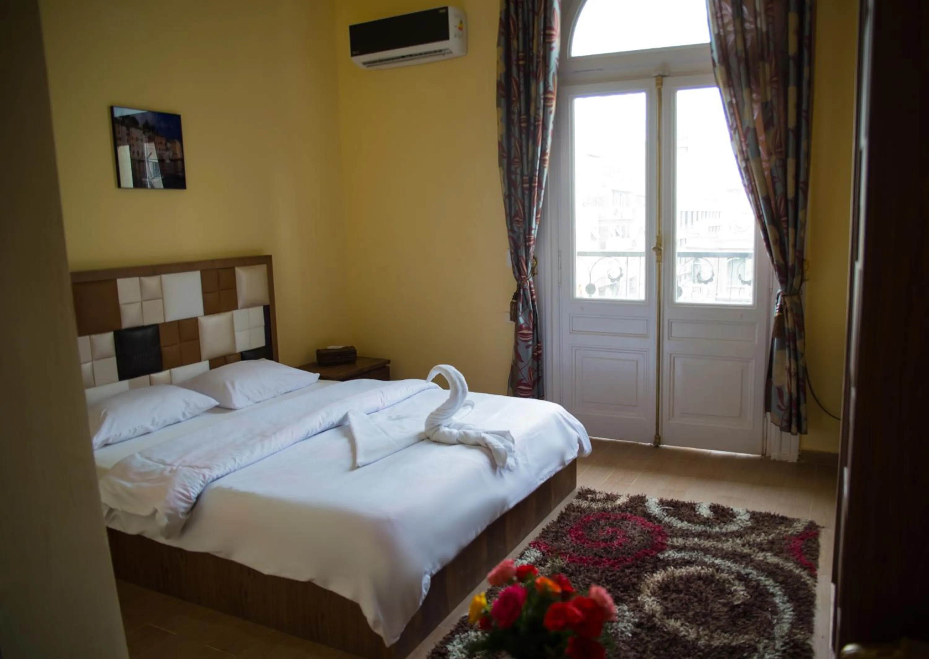 Bed in New Grand Royal Hotel Cairo