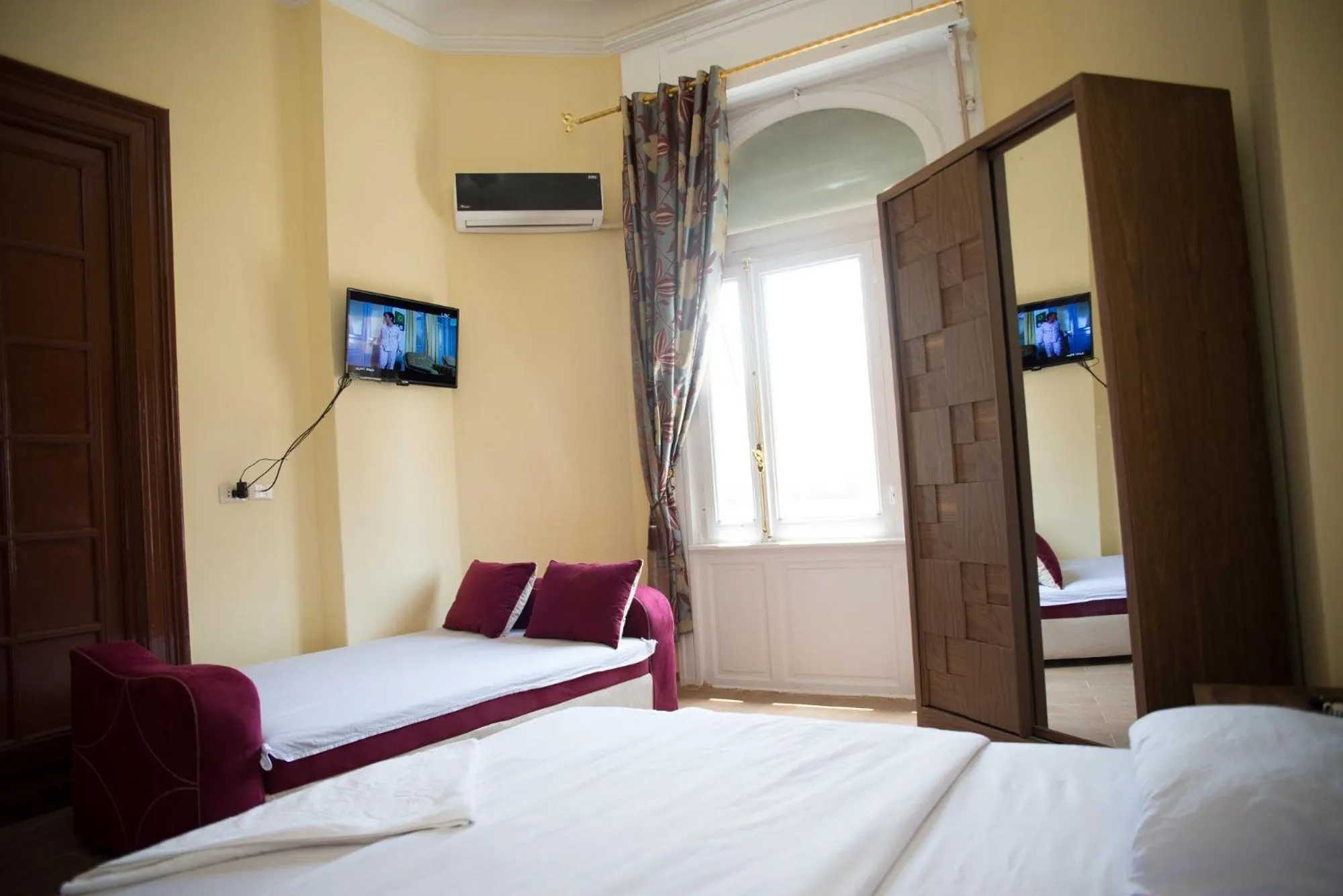 Bed in New Grand Royal Hotel Cairo