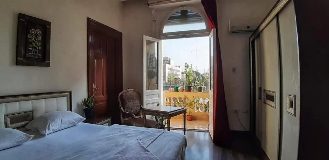 Bed in New Grand Royal Hotel Cairo