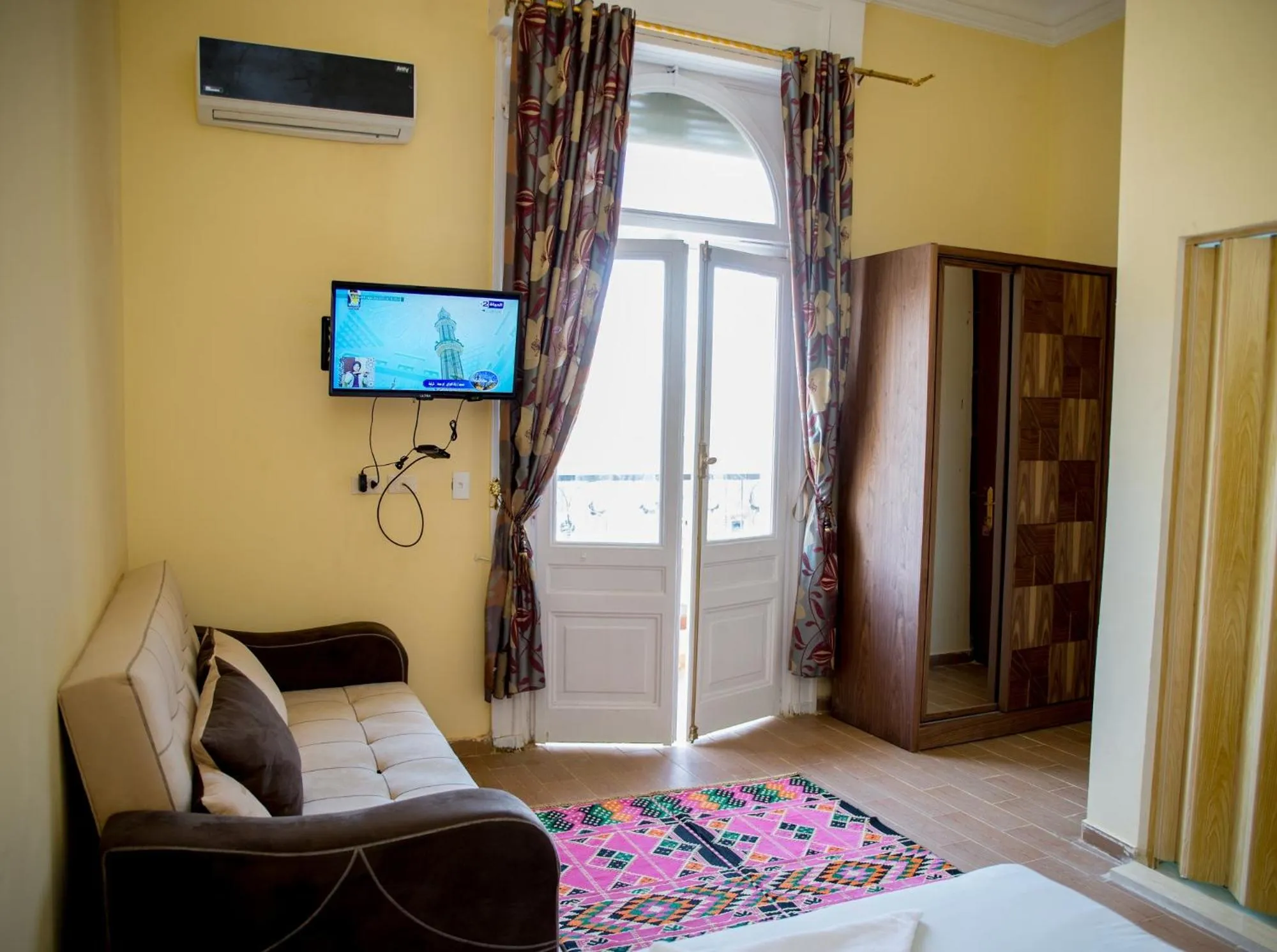 Bed in New Grand Royal Hotel Cairo