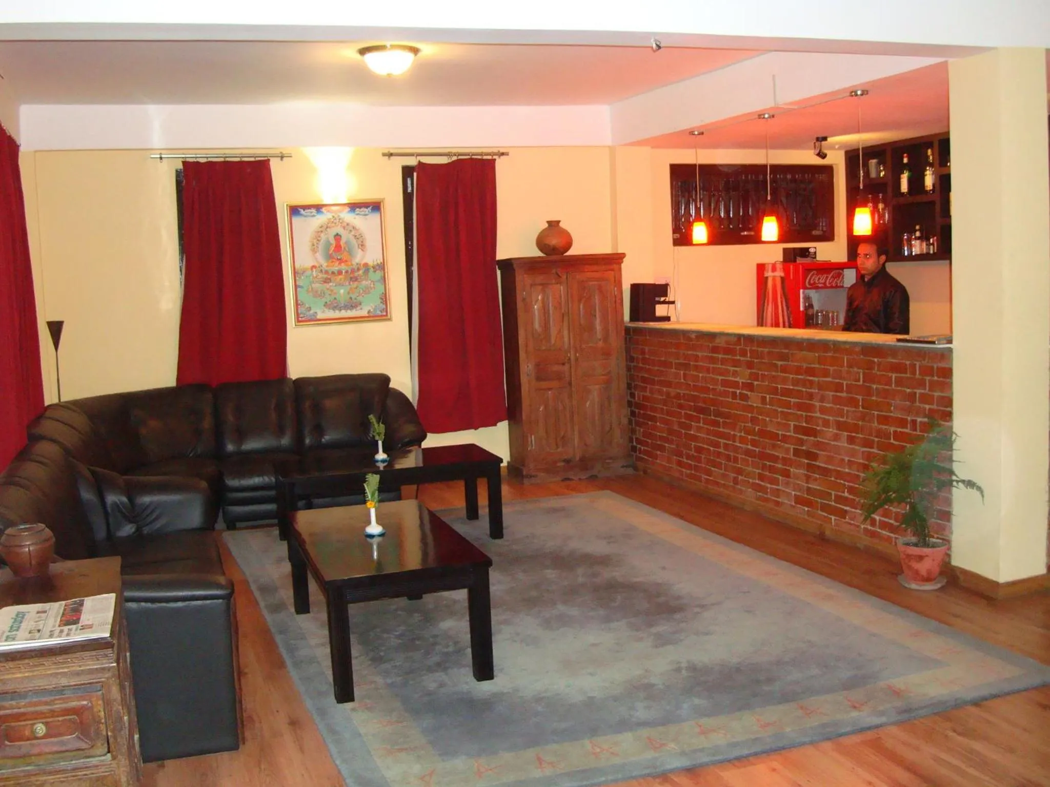 Communal lounge/ TV room in Royal Astoria Hotel