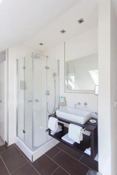 Bathroom in Restaurant Niedmühle Land & Genuss Hotel