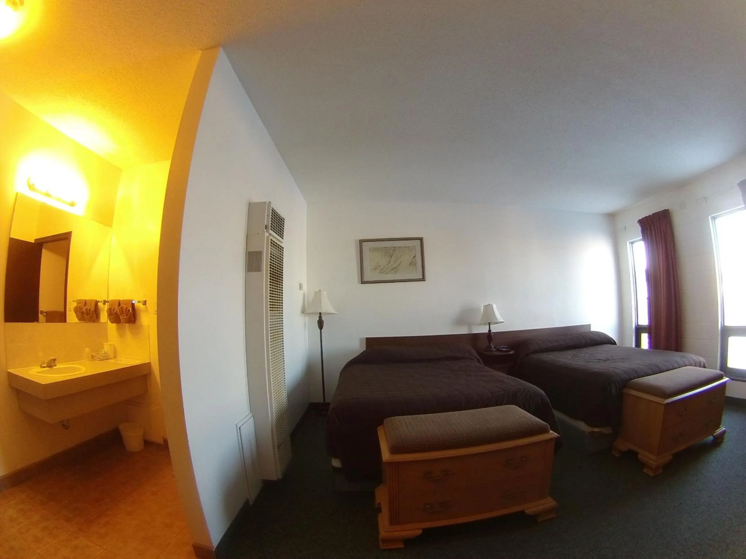 Bed in Rycroft Hotel