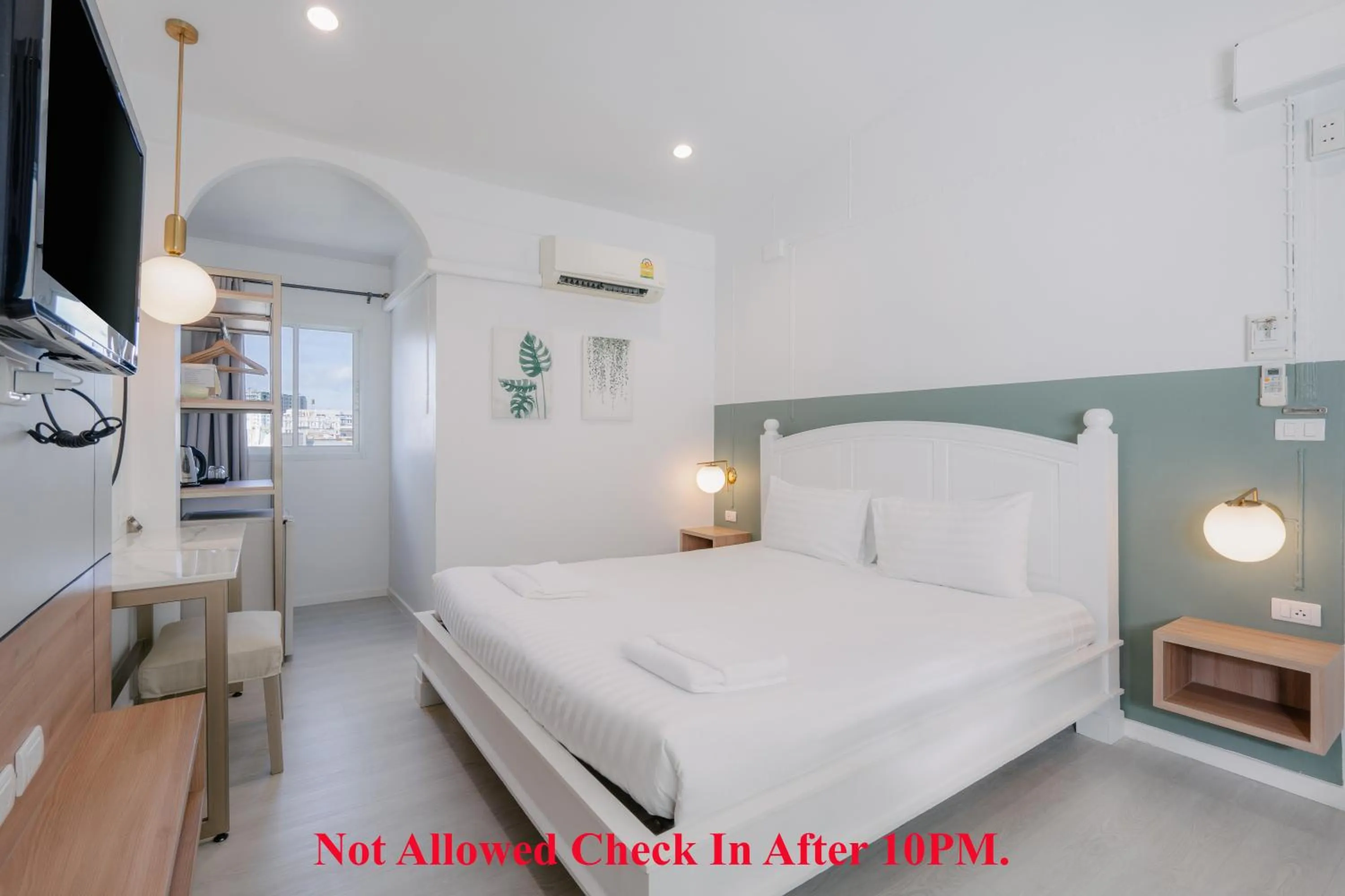 Bed in Baan Sutra Guesthouse