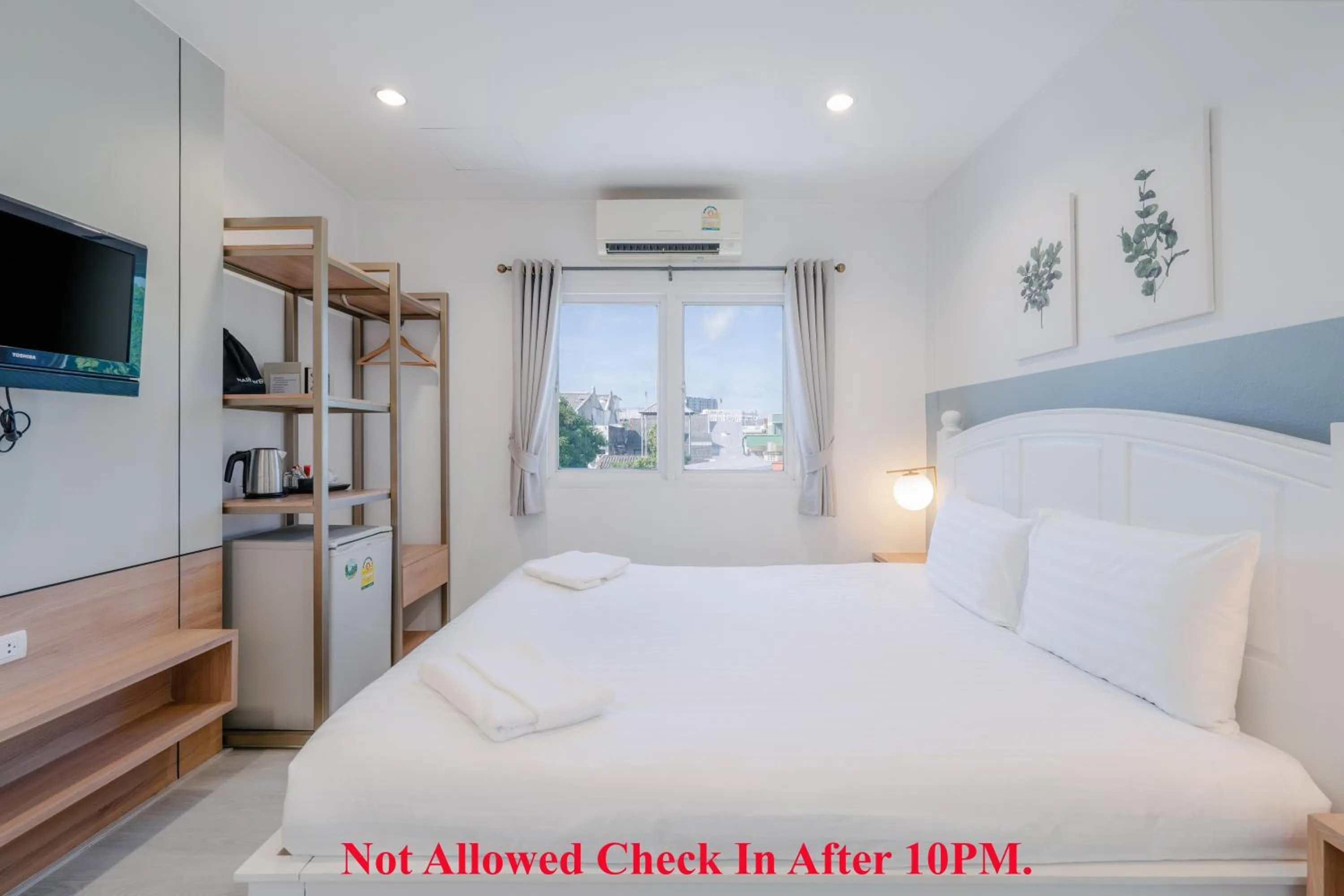 Bed in Baan Sutra Guesthouse