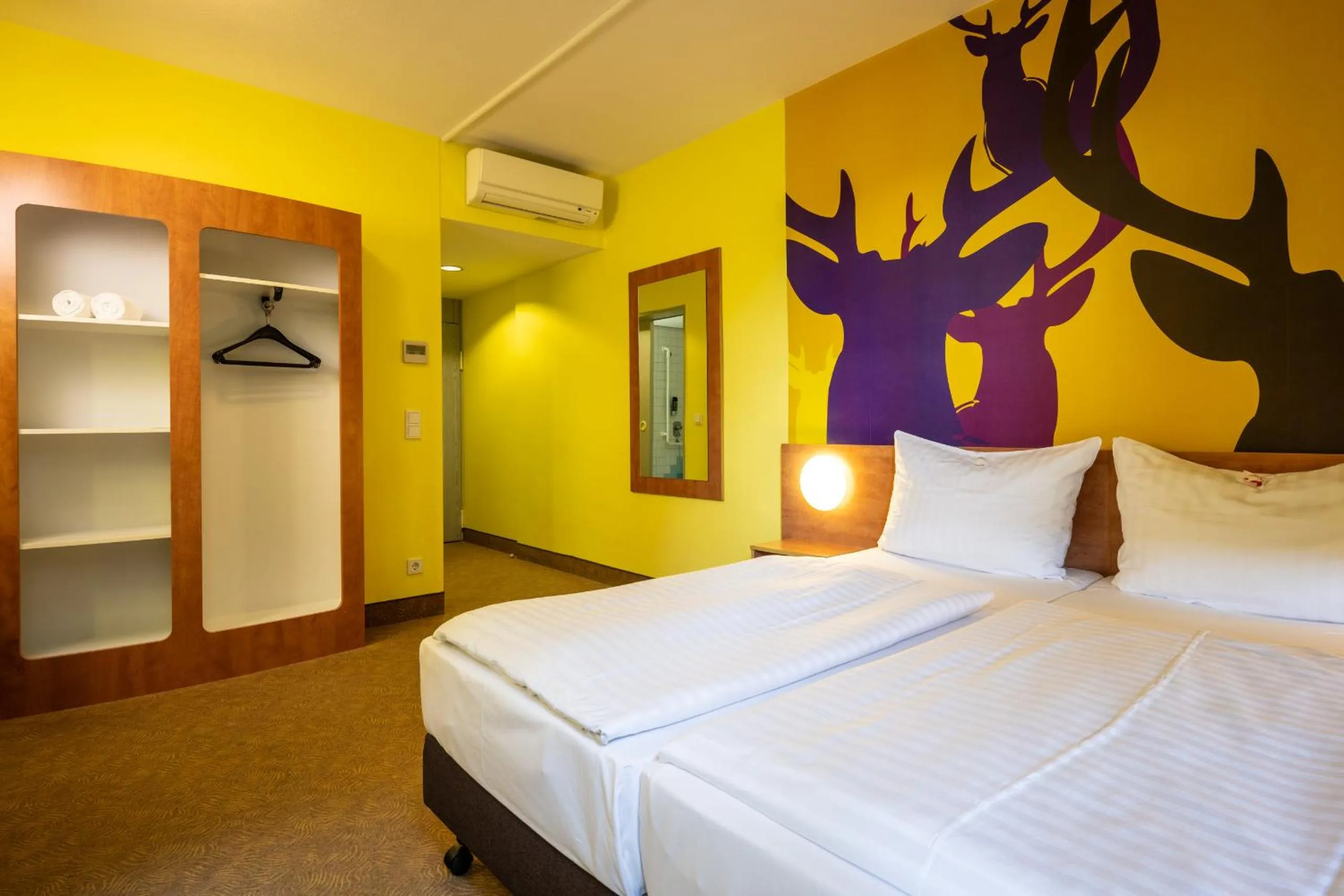 Photo of the whole room, Bed in Hotel Göttingen-West