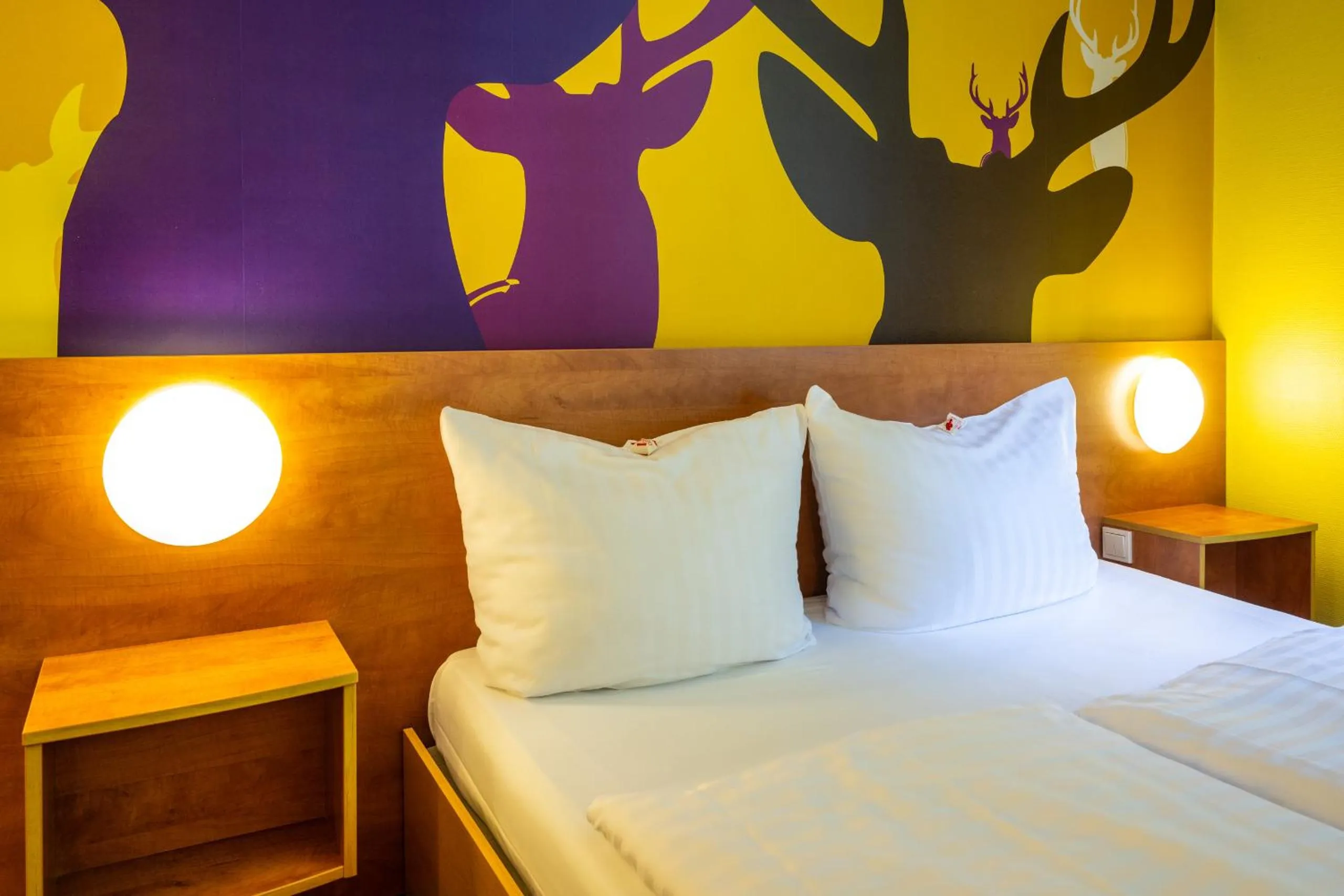 Photo of the whole room, Bed in Hotel Göttingen-West