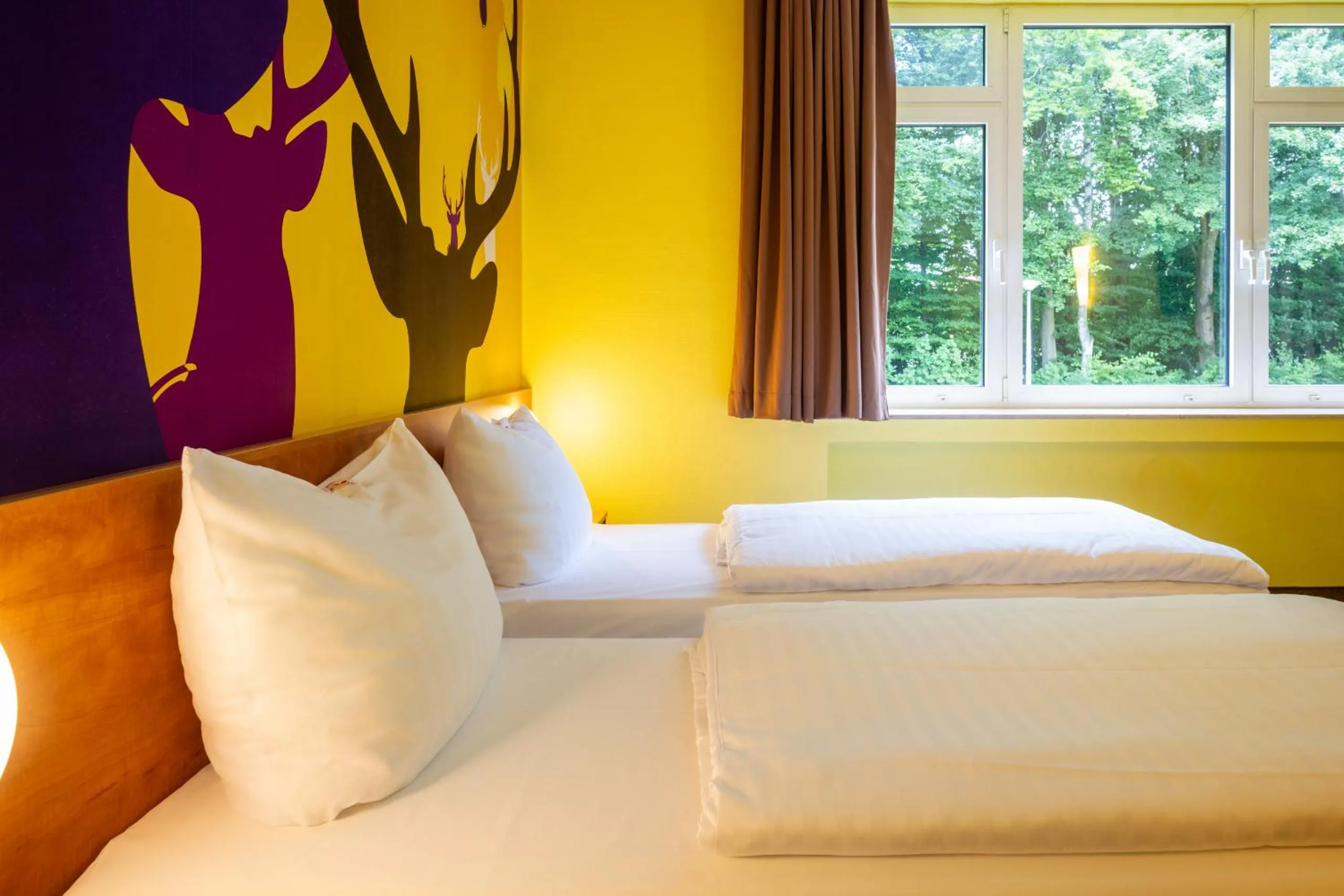 Photo of the whole room, Bed in Hotel Göttingen-West