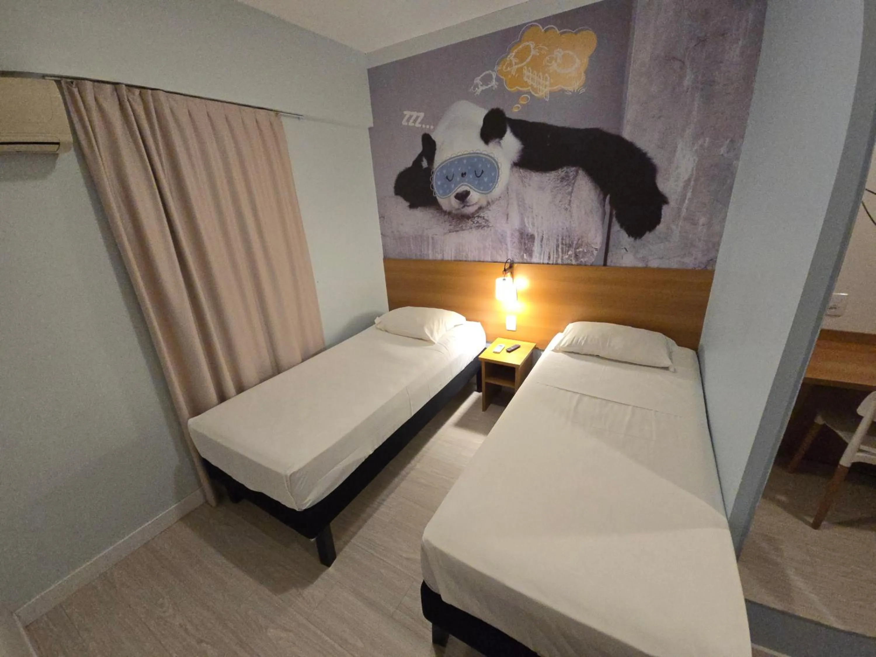 Bed in Golden Tower Maurilio Biagi by Fênix Hotéis