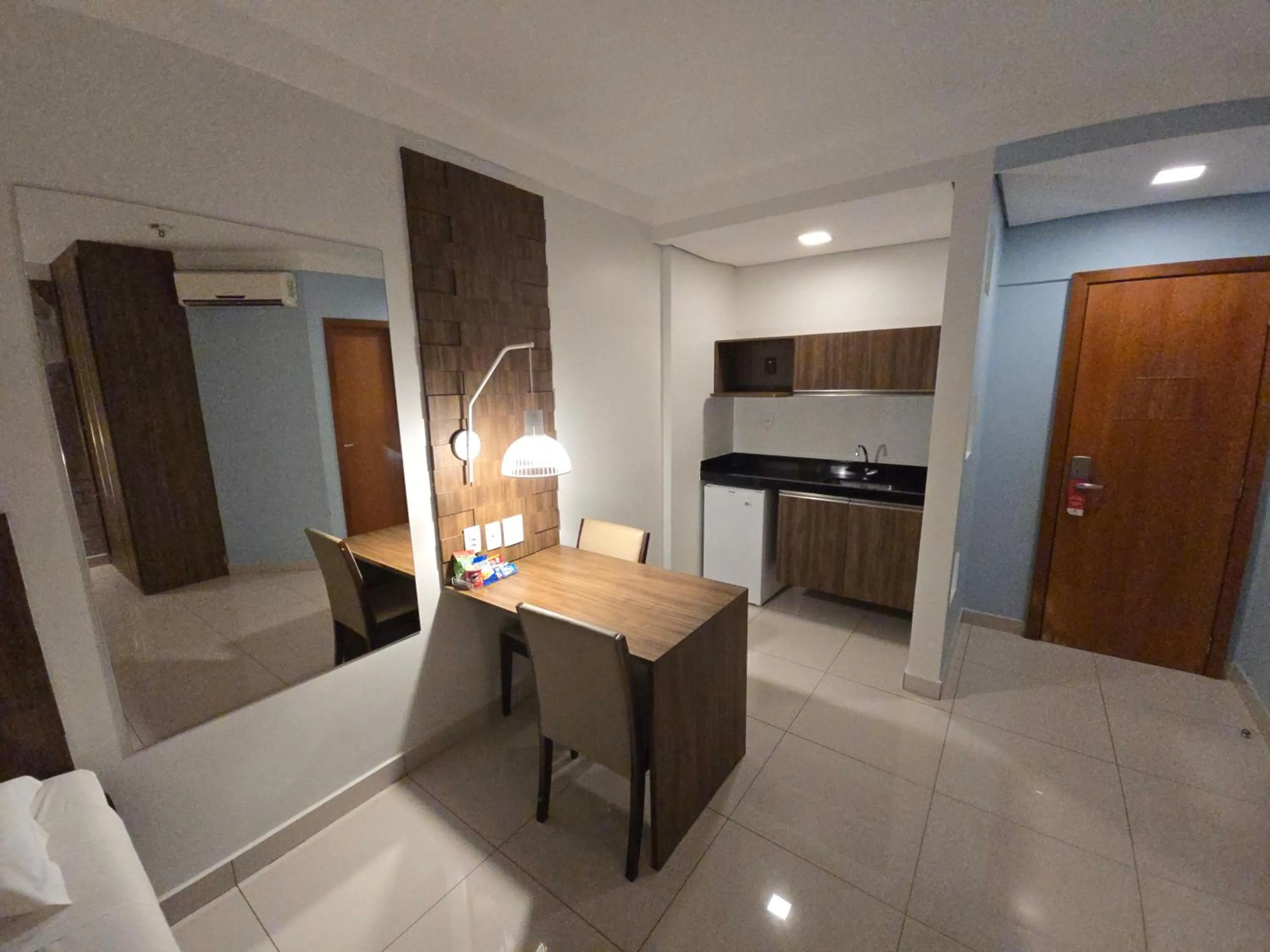 Kitchen or kitchenette in Golden Tower Maurilio Biagi by Fênix Hotéis