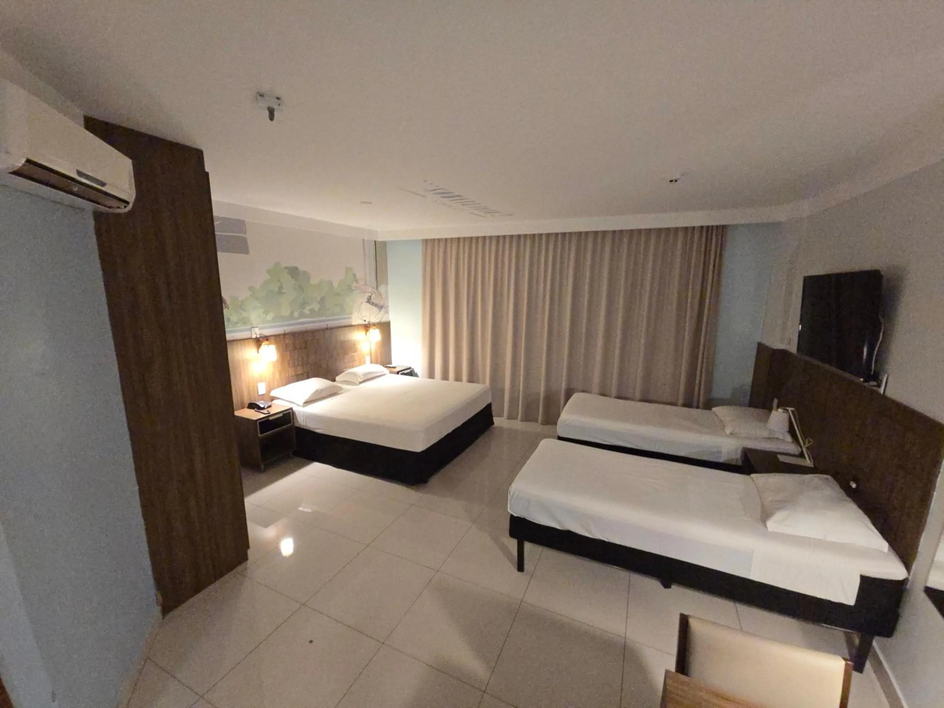 Bed in Golden Tower Maurilio Biagi by Fênix Hotéis