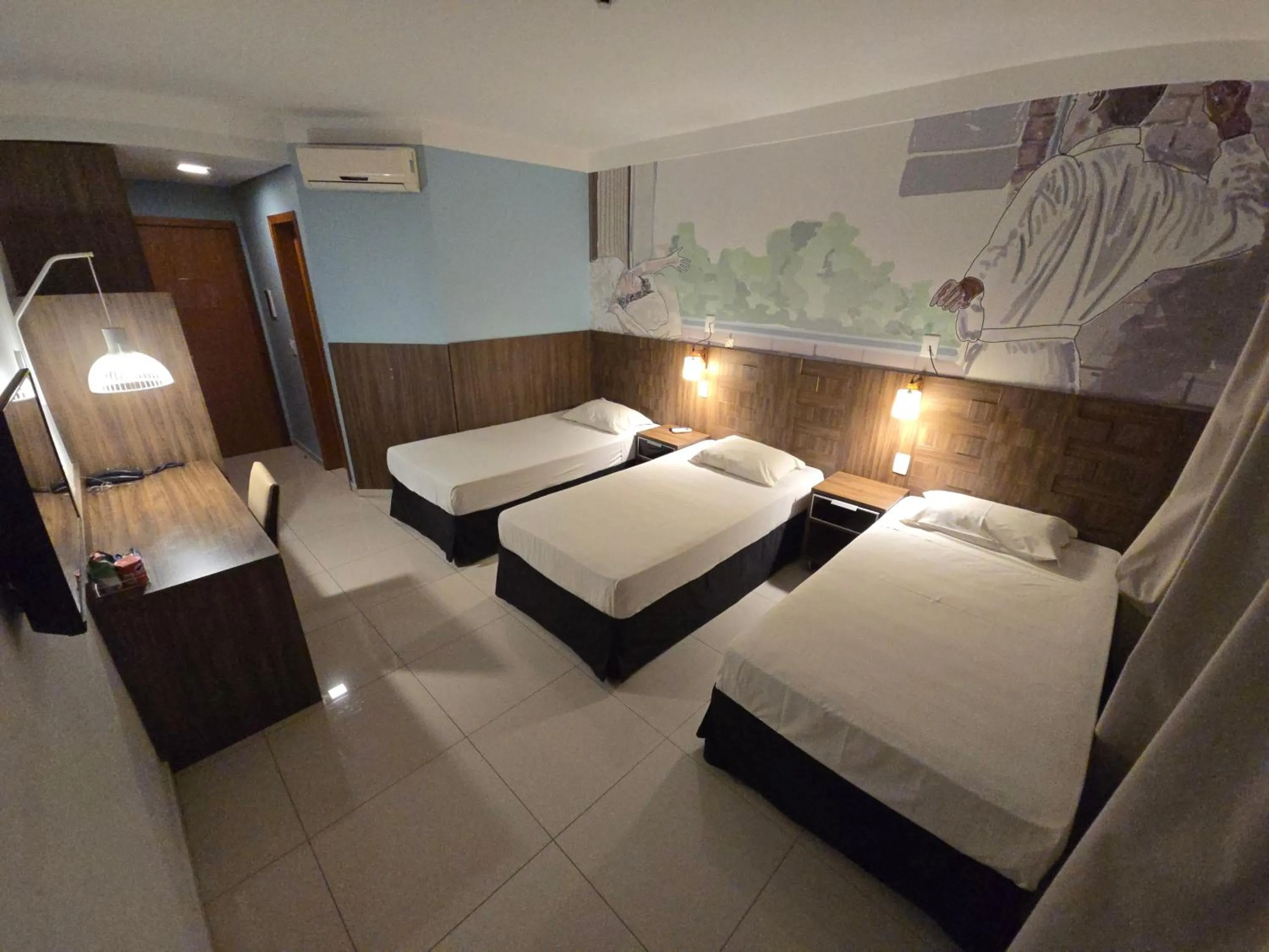 Bed in Golden Tower Maurilio Biagi by Fênix Hotéis