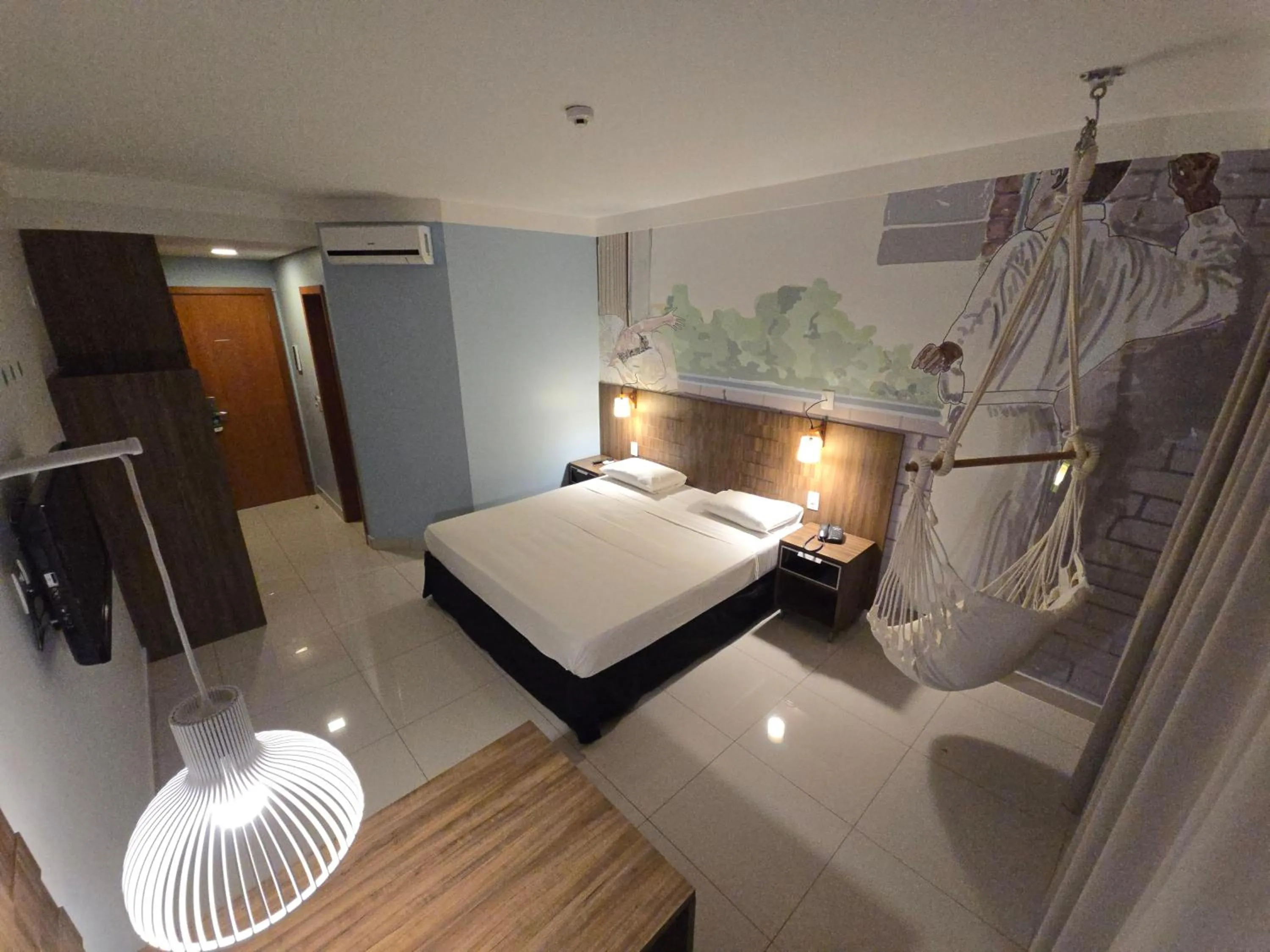 Bed in Golden Tower Maurilio Biagi by Fênix Hotéis