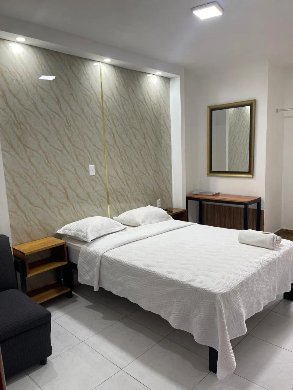 Bed in Hotel Costa Inn