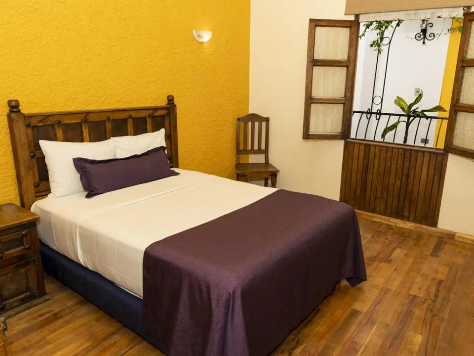 Bed in Gamma Puebla Señorial Centro