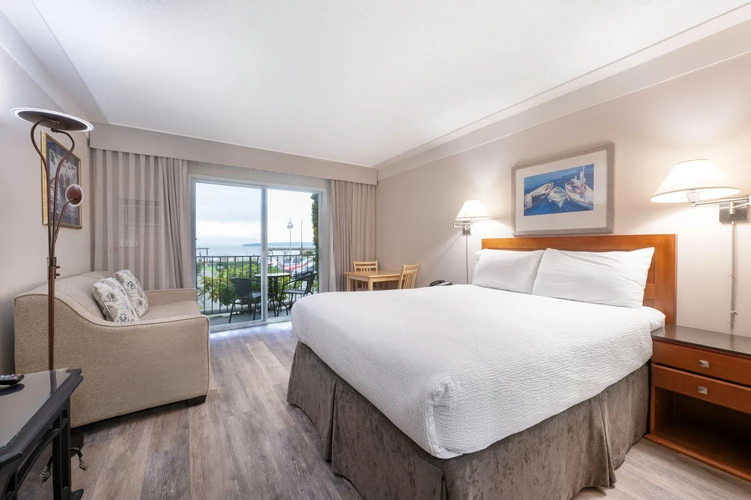 Bed in Sidney Waterfront Inn & Suites