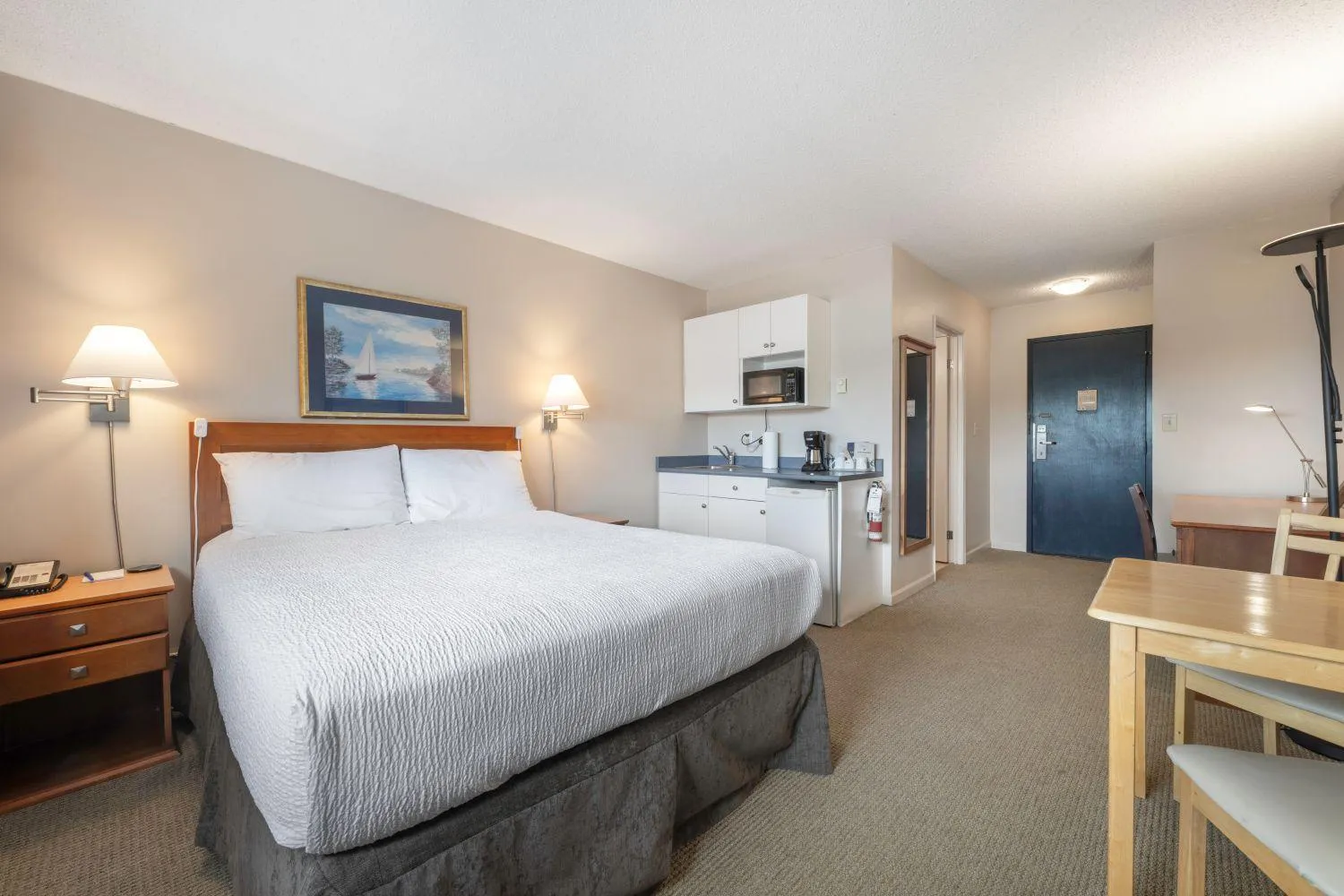 Bed in Sidney Waterfront Inn & Suites