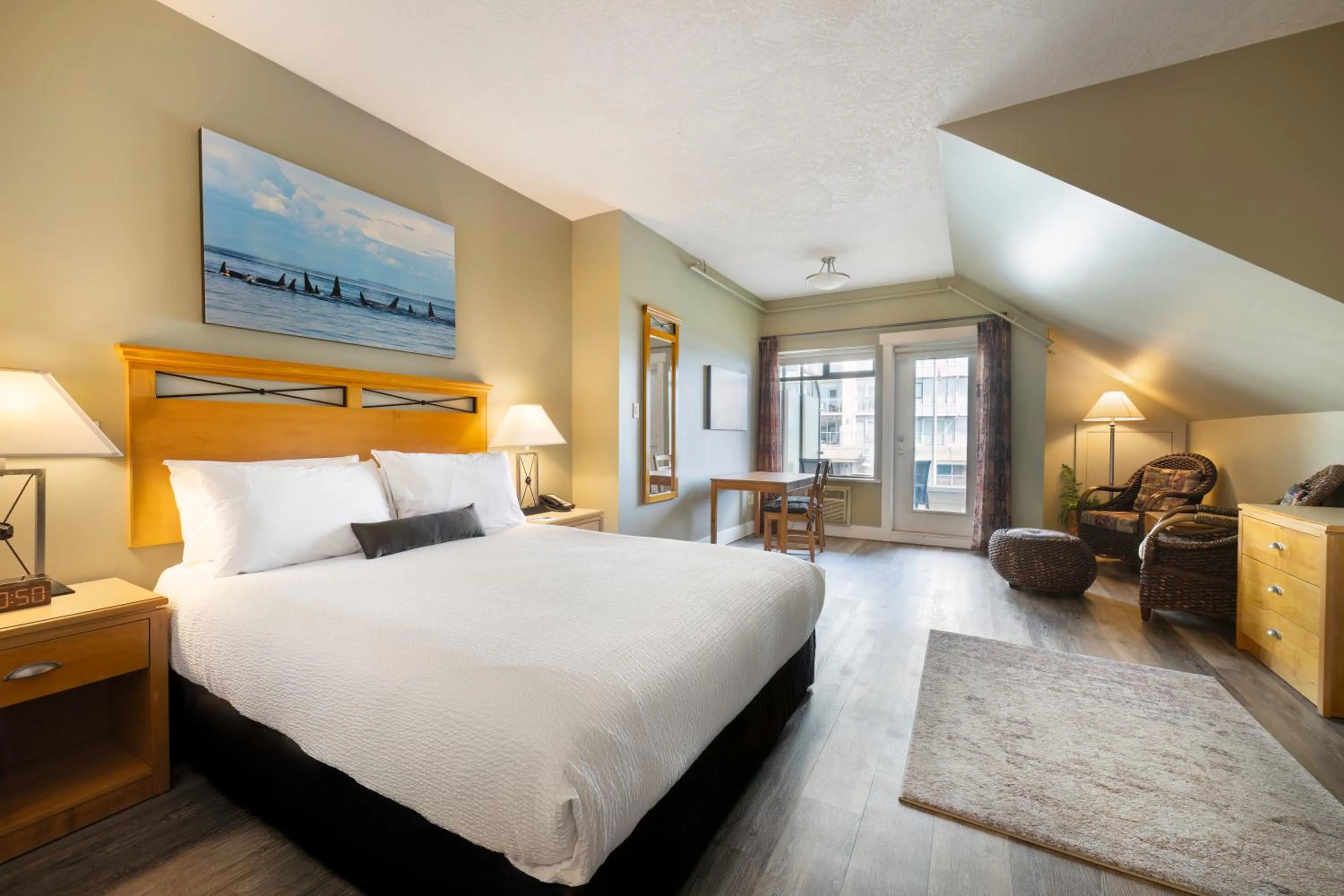 Bed in Sidney Waterfront Inn & Suites