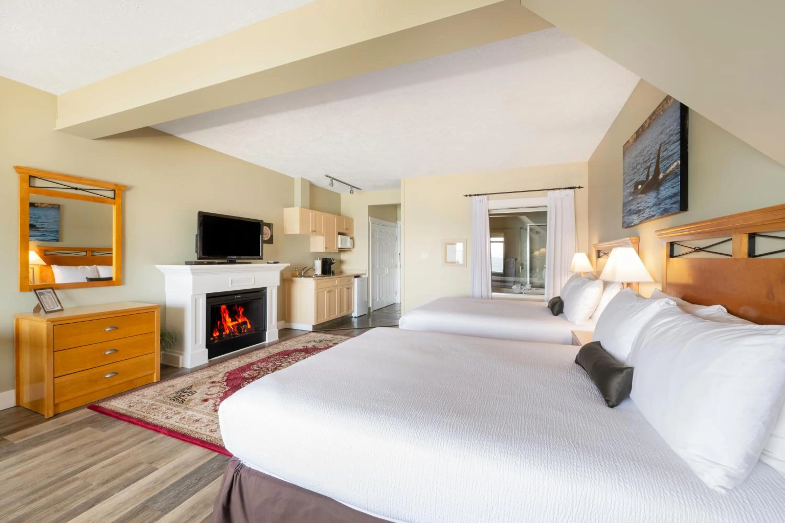 Bed in Sidney Waterfront Inn & Suites