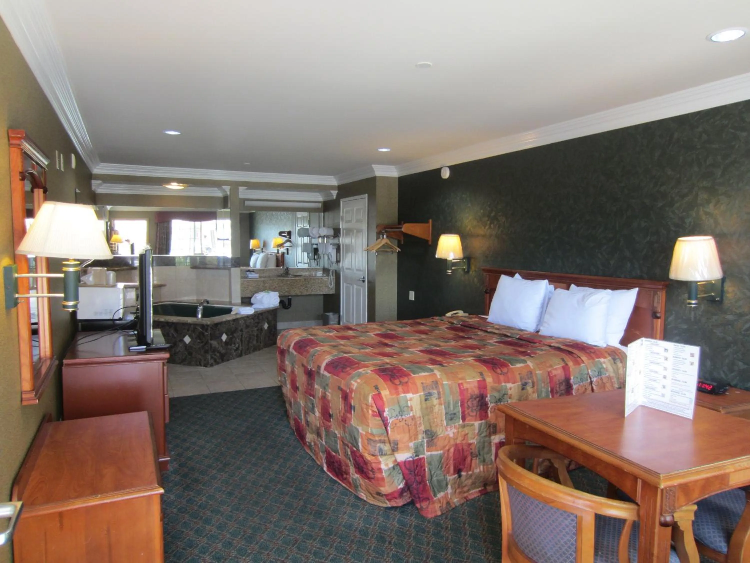 Photo of the whole room, Bed in Crystal Inn Suites & Spas