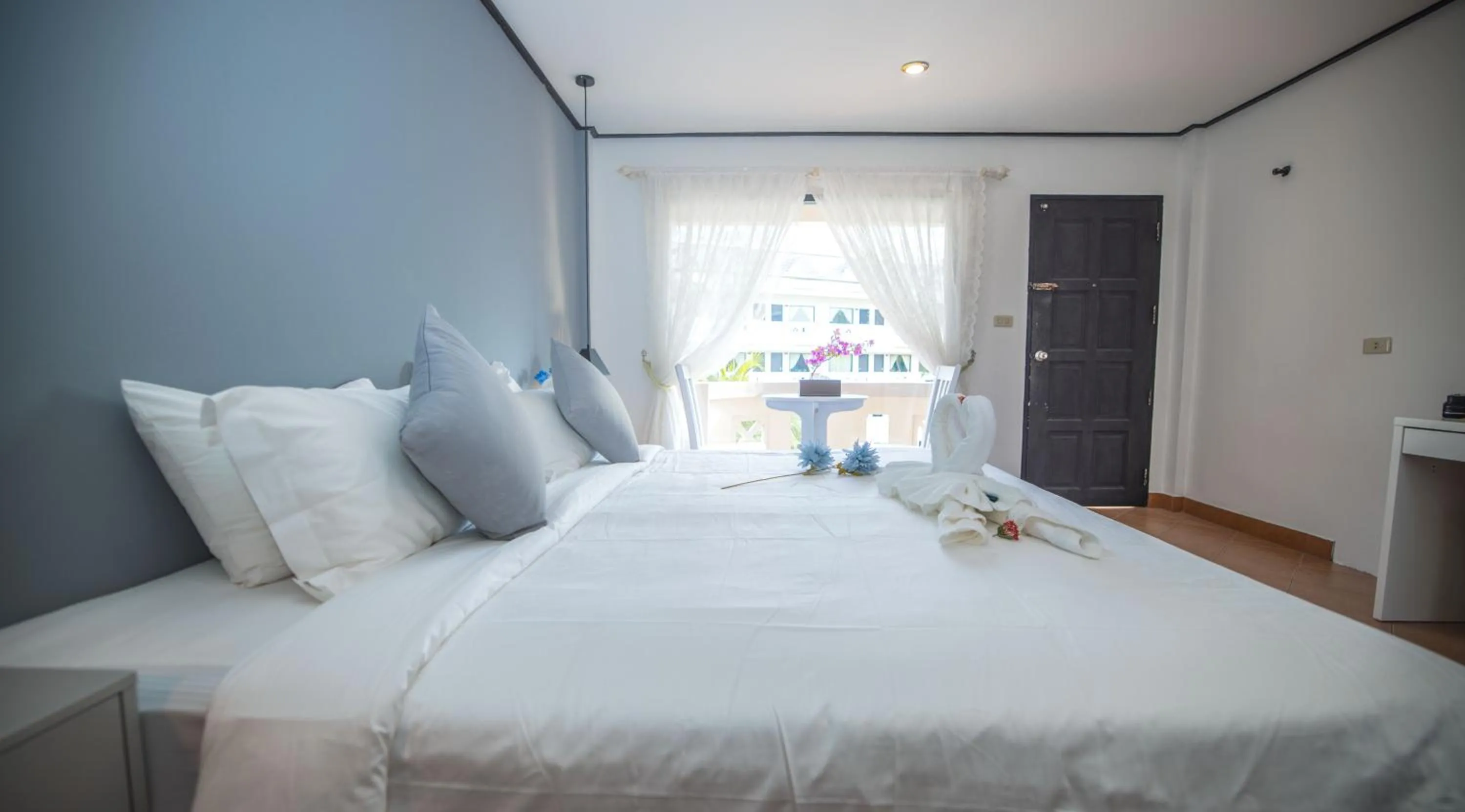 Bed in Blue Carina Hotel Phuket