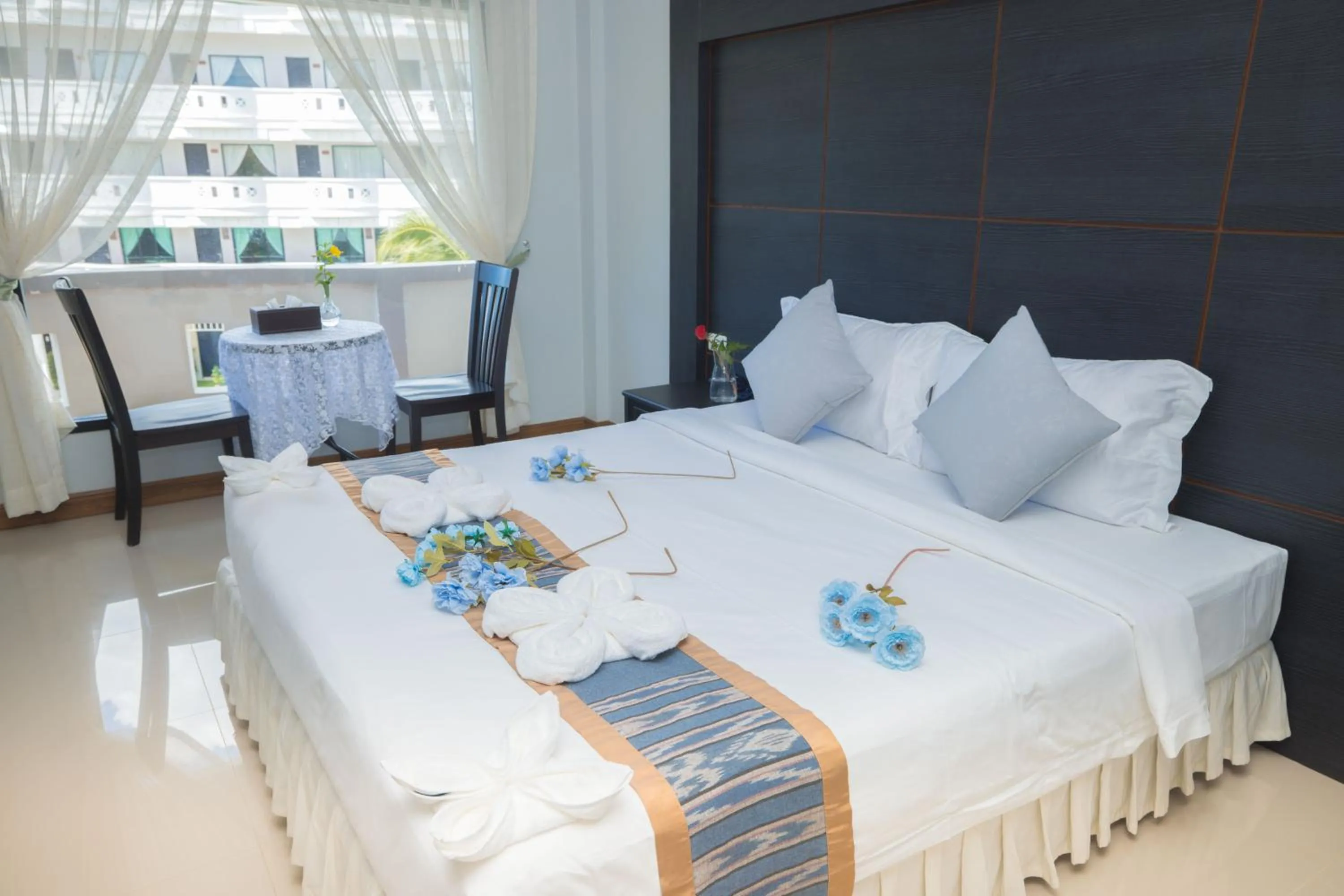 Living room, Bed in Blue Carina Hotel Phuket