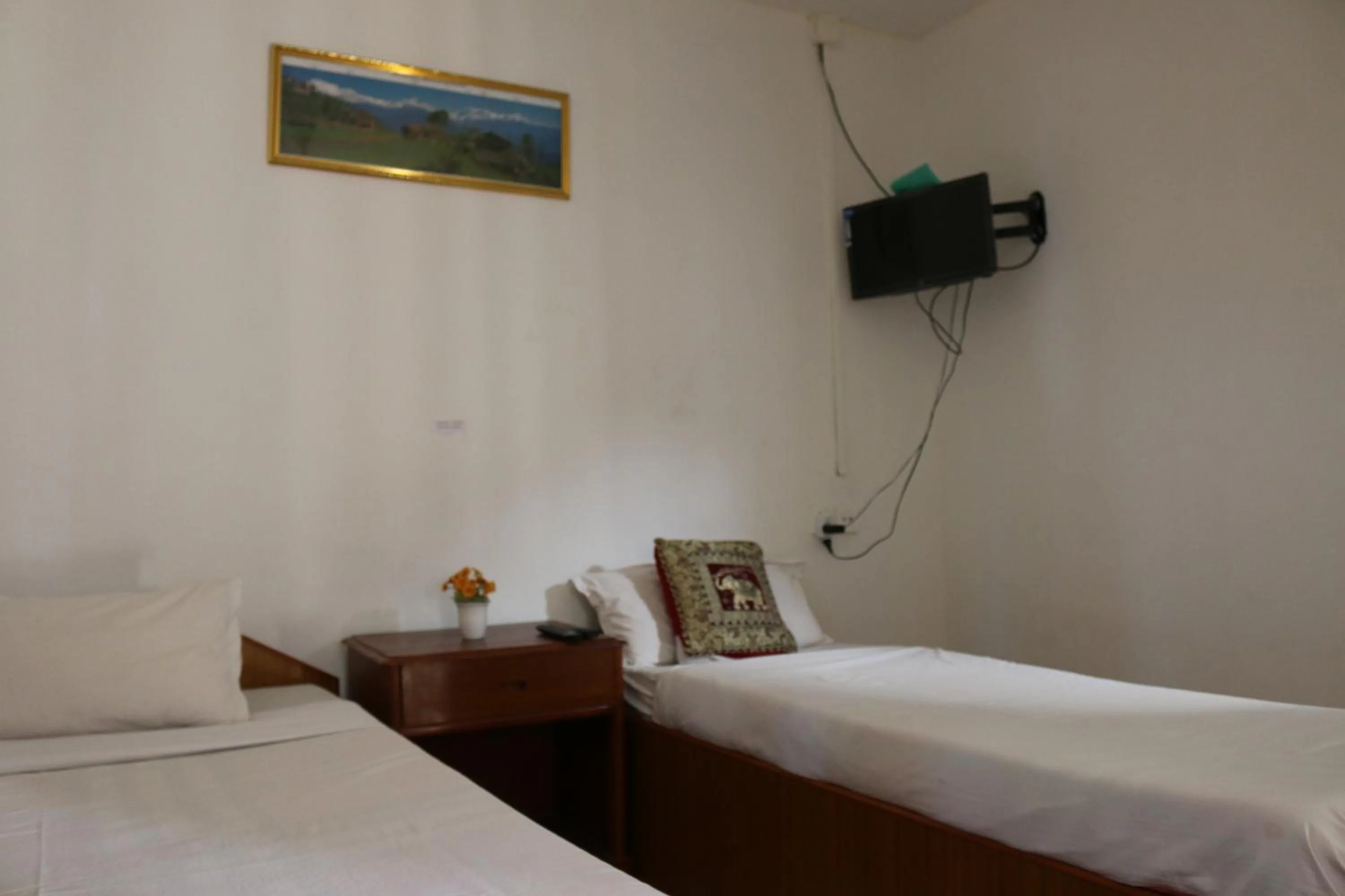 Bed in Gurkha Lodge