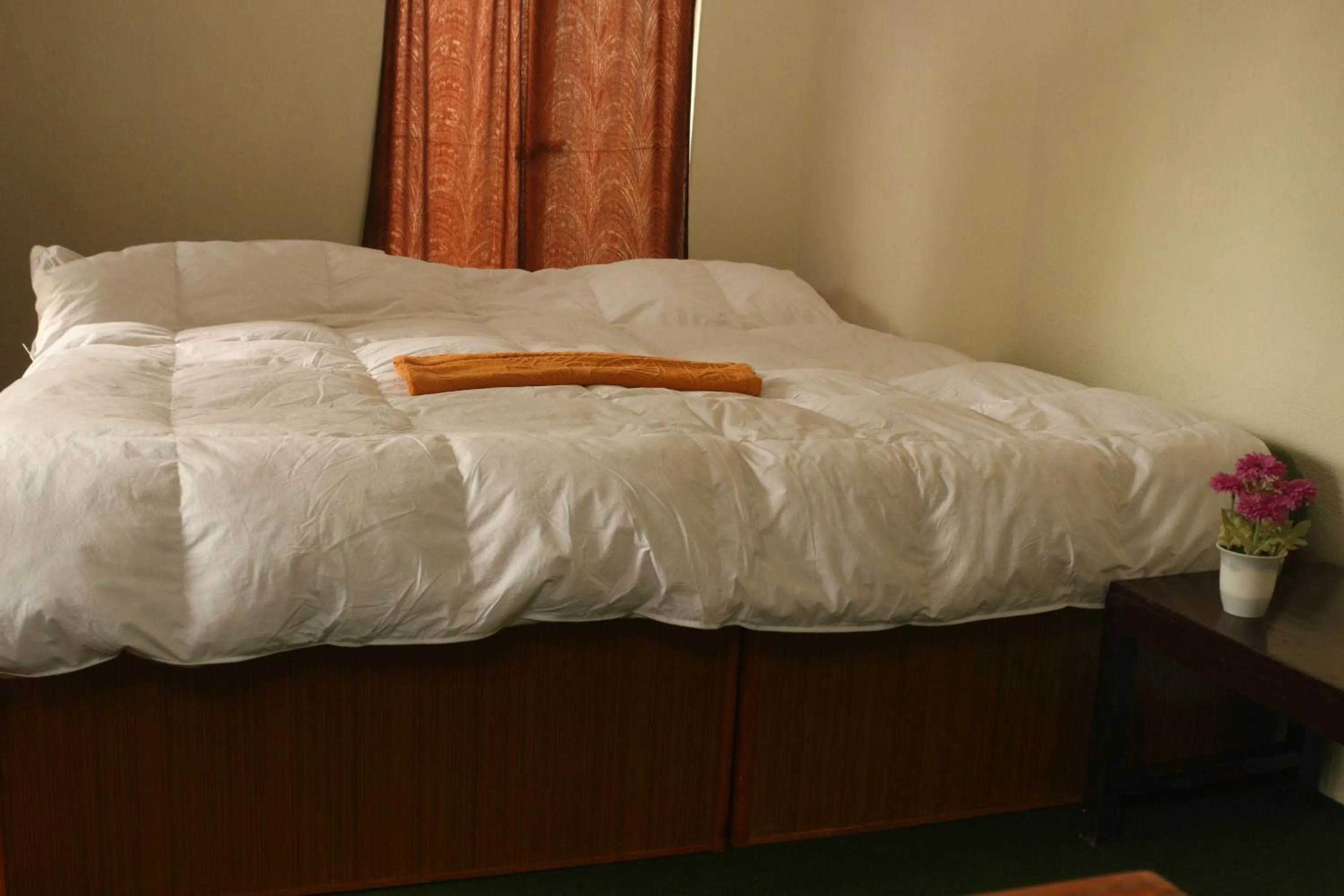Bed in Gurkha Lodge