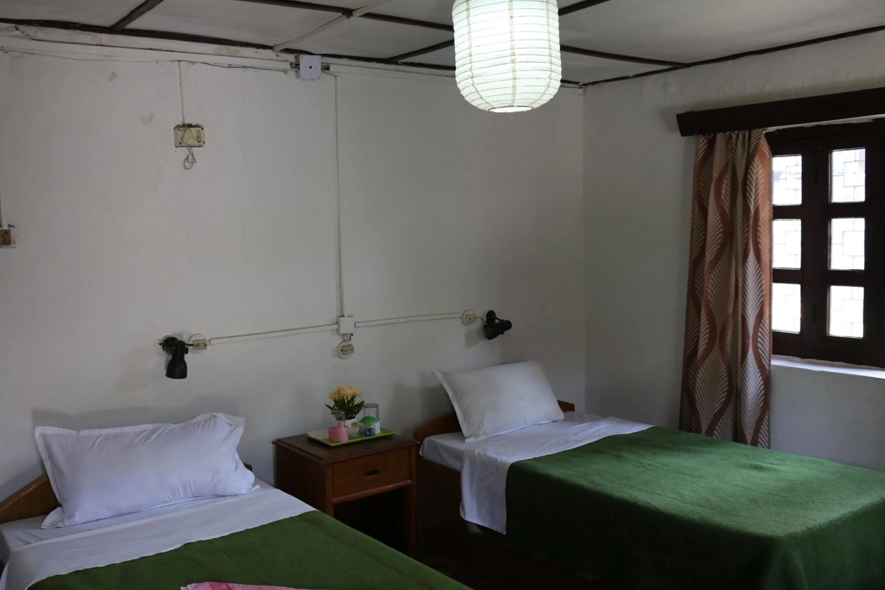 Bed in Gurkha Lodge