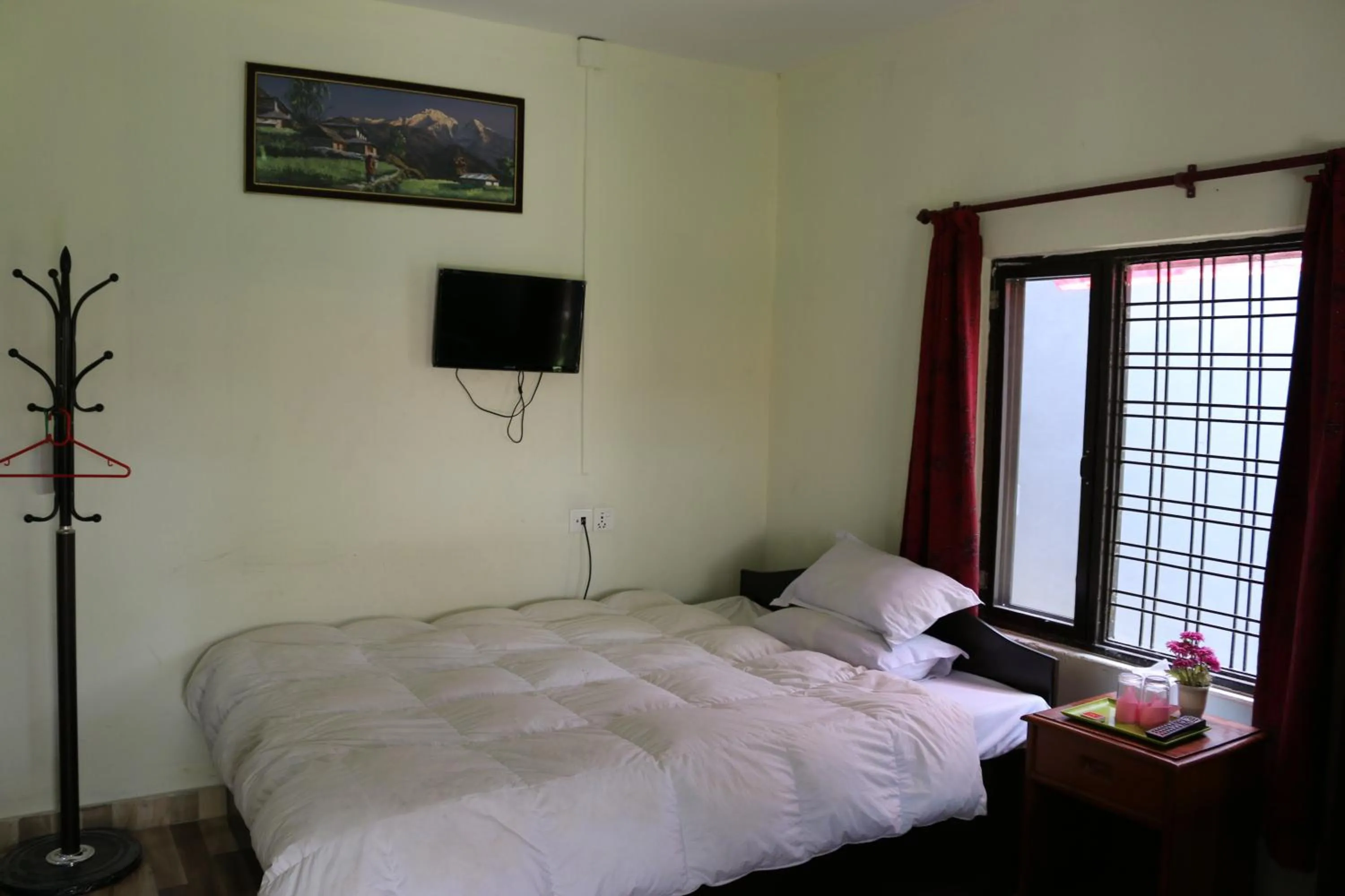 Bed in Gurkha Lodge