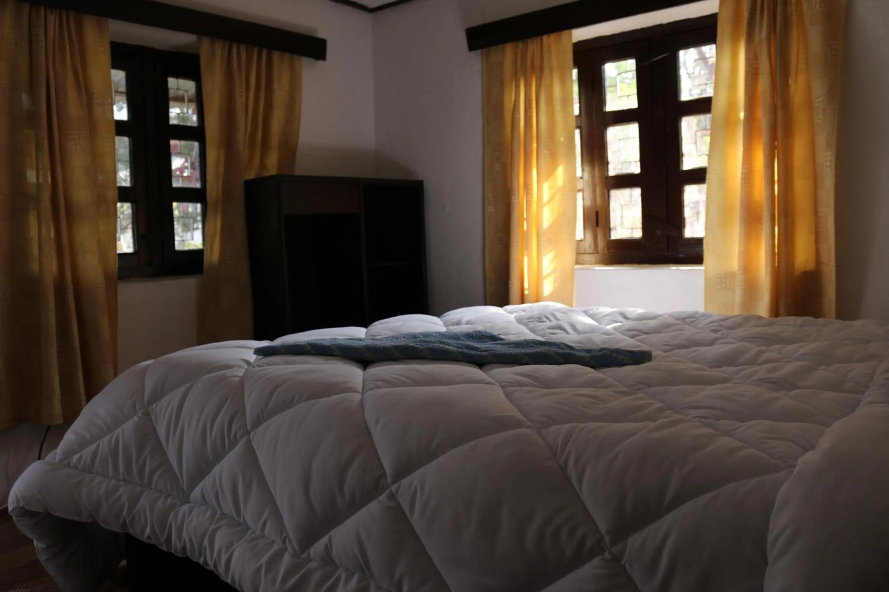Bed in Gurkha Lodge