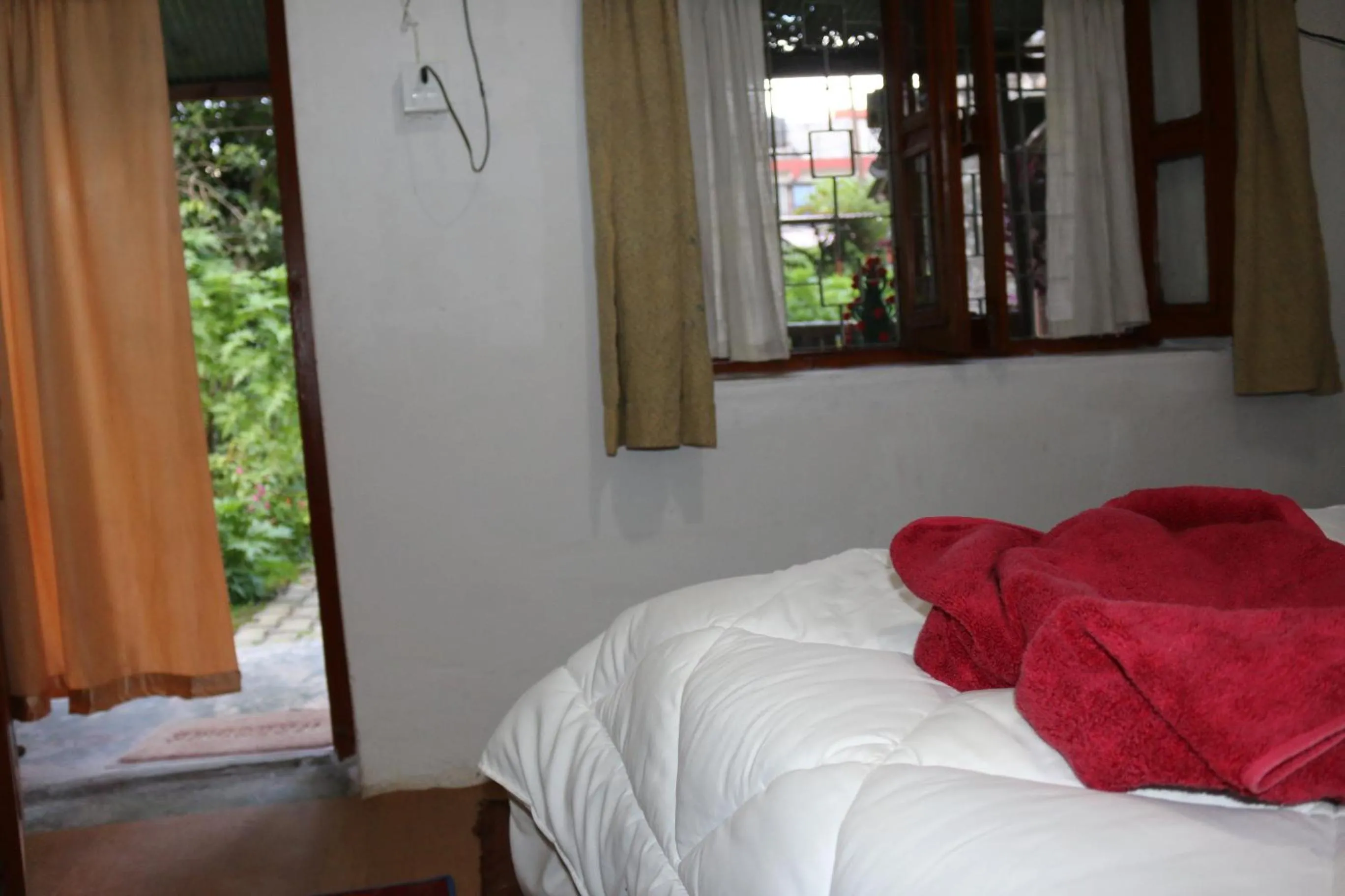 Bed in Gurkha Lodge