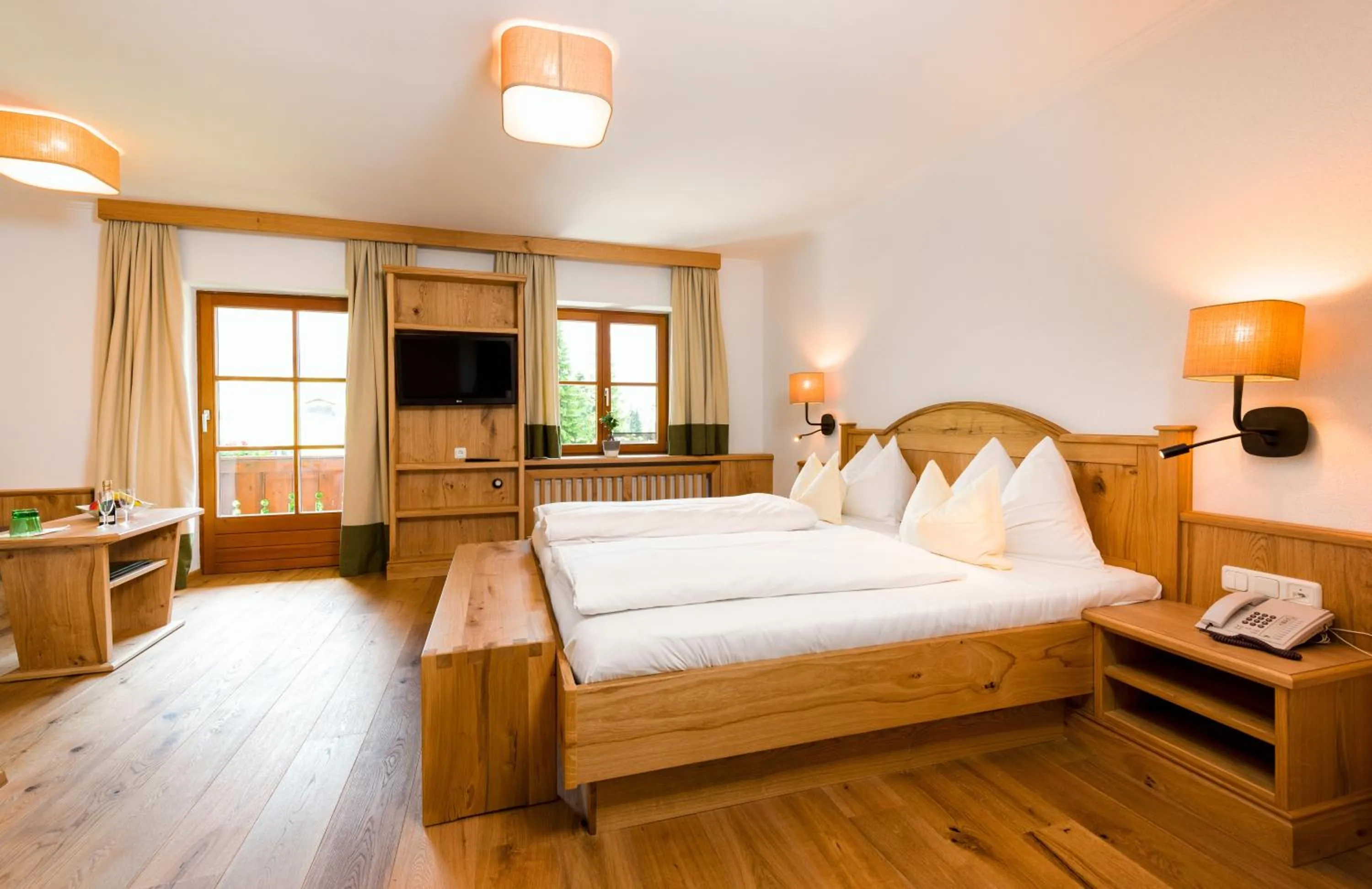 Photo of the whole room, Bed in Wellness & Sporthotel Alpenhof