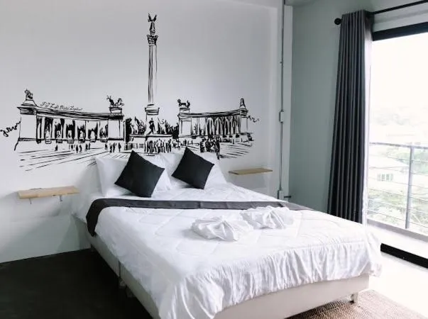 Bed in PJ Loft Hotel