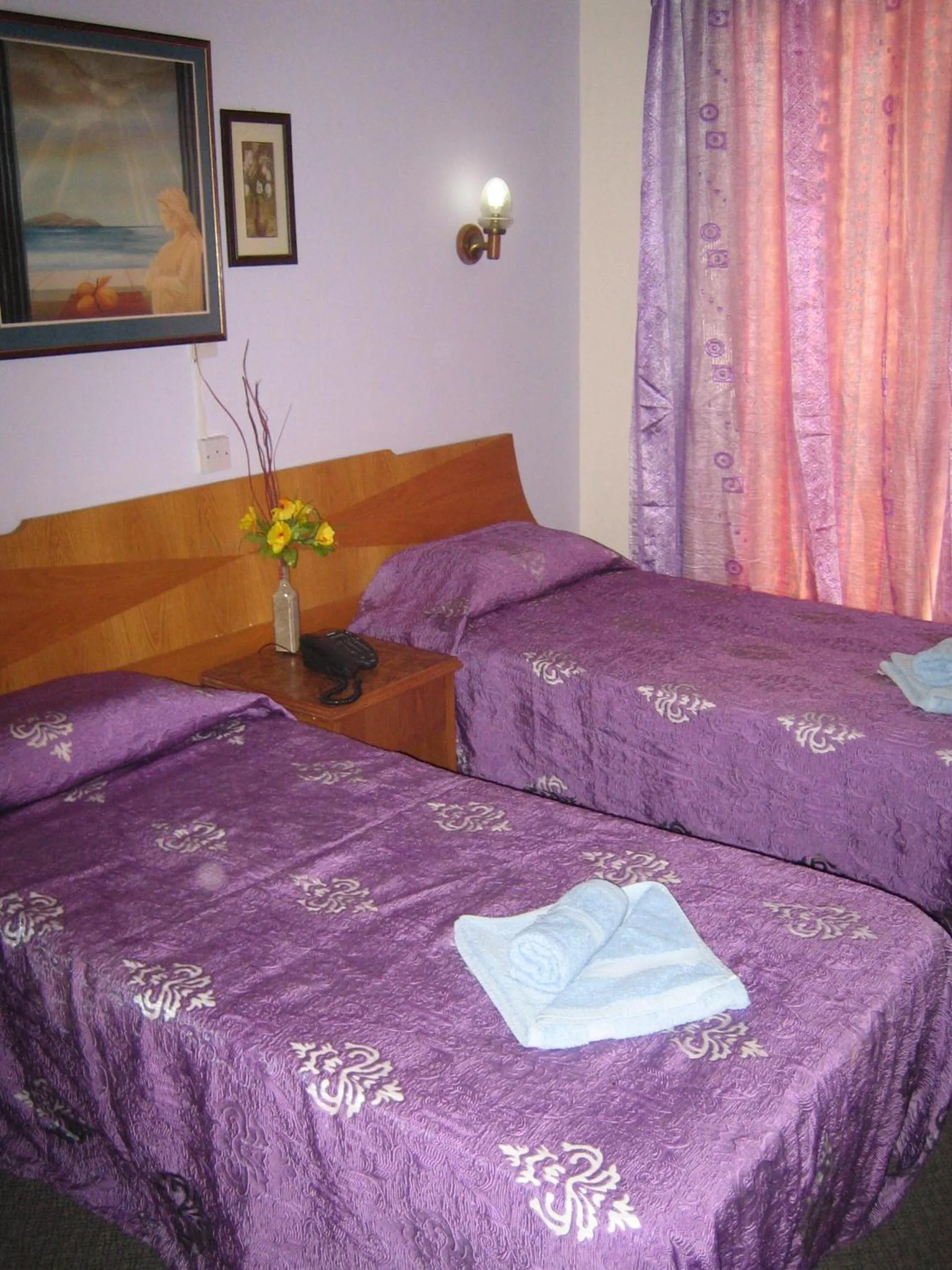 Bed in Onisillos Hotel