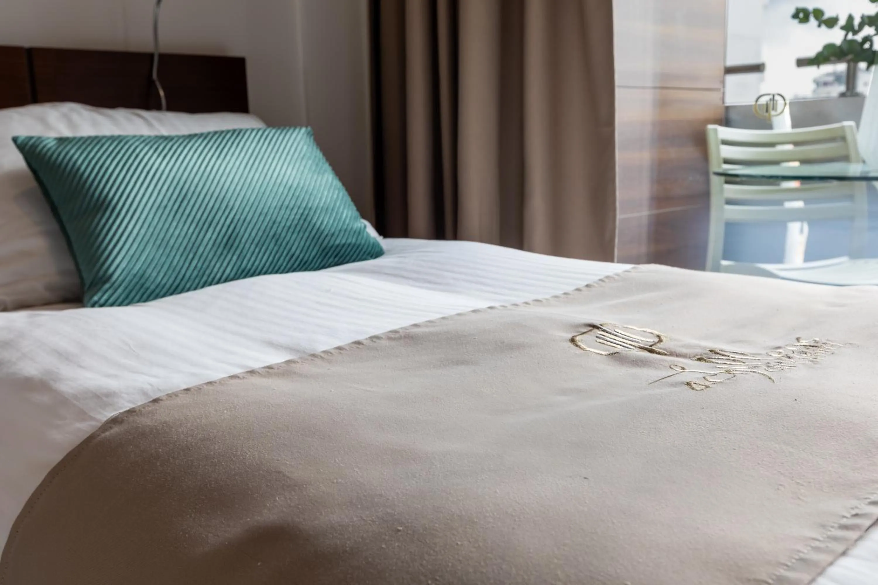 Bed in Achilleos City Hotel