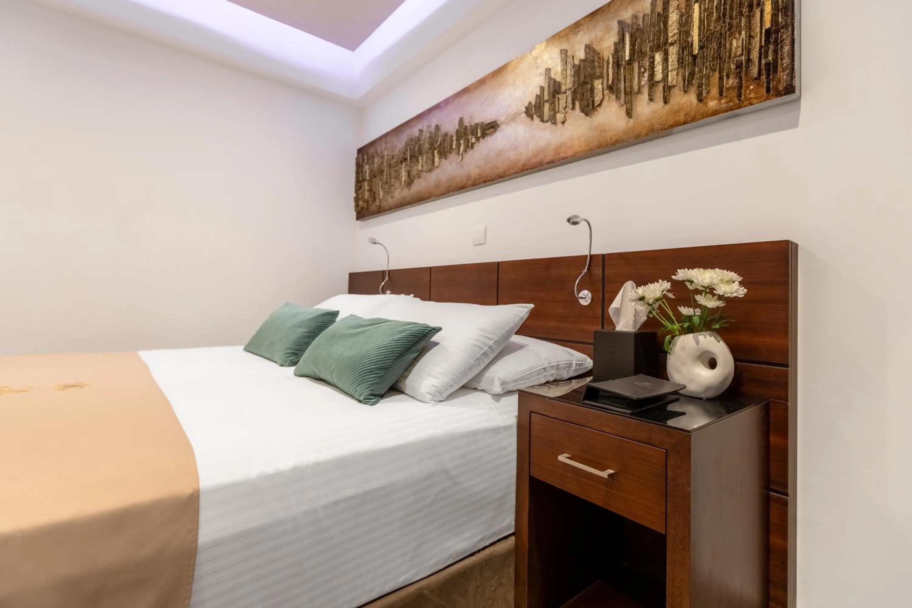 Bed in Achilleos City Hotel