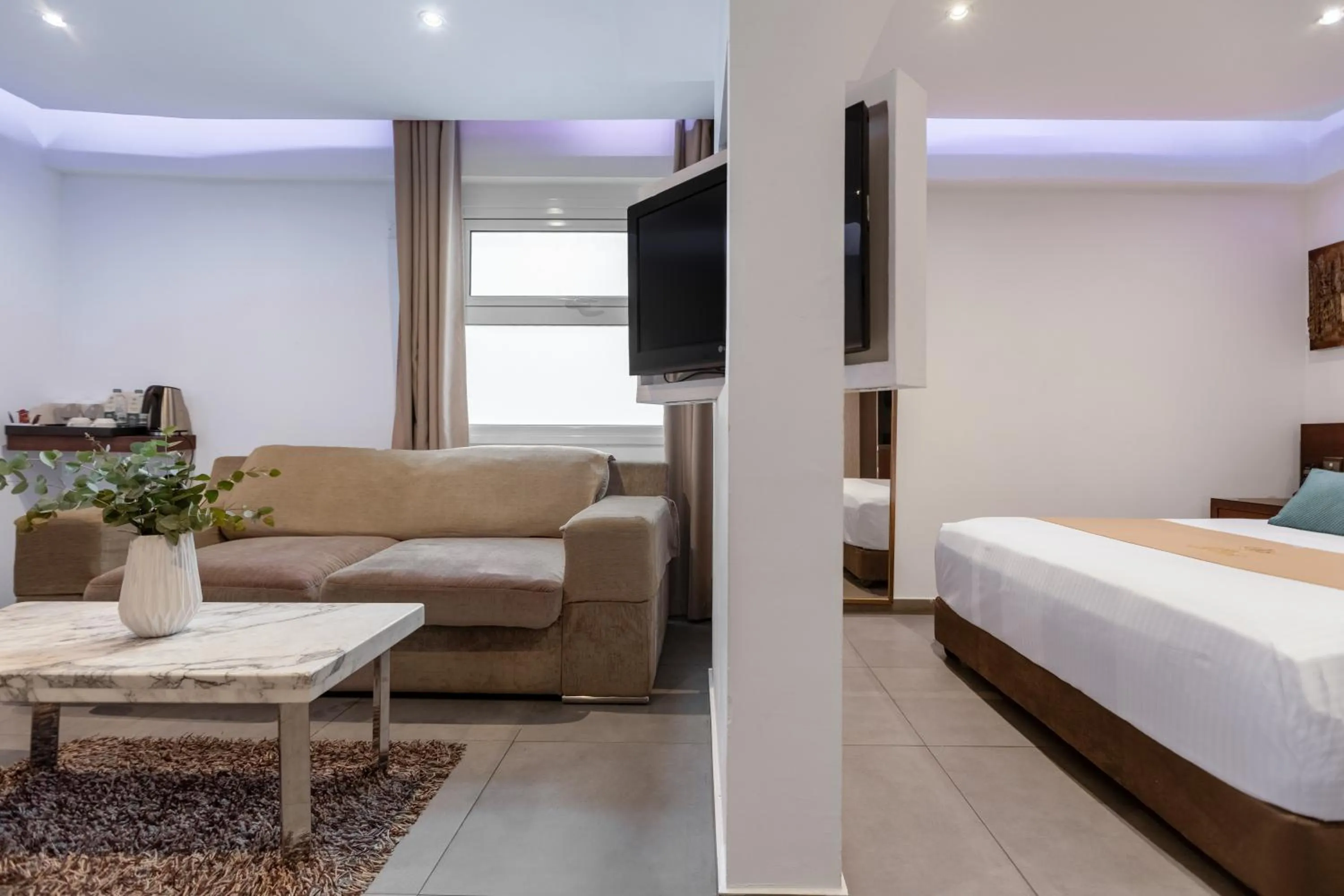 Bed in Achilleos City Hotel