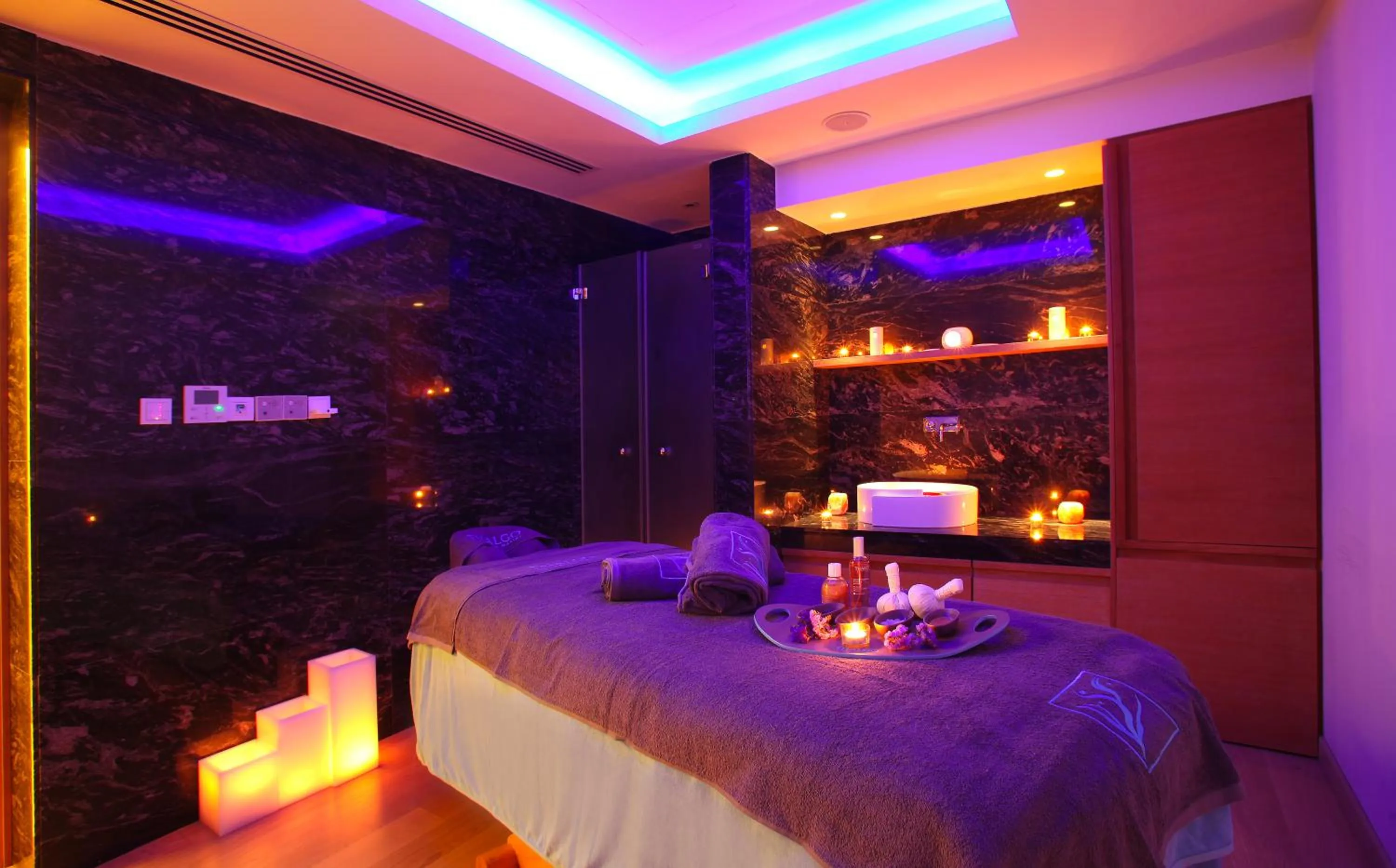 Bed in Olympic Residence Deluxe Apartments