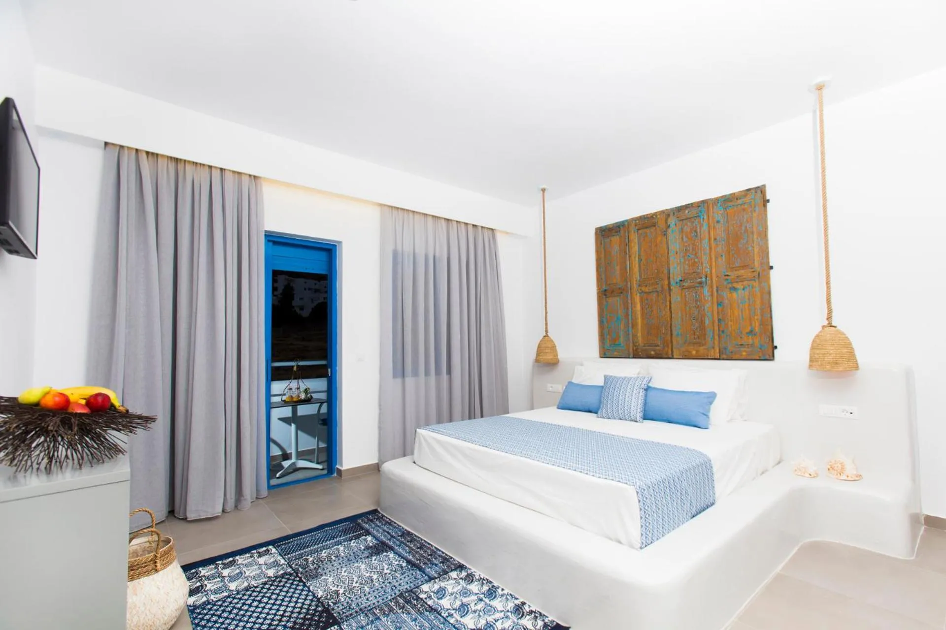 Bedroom, Bed in Lindos Portes Suites - Adults Only
