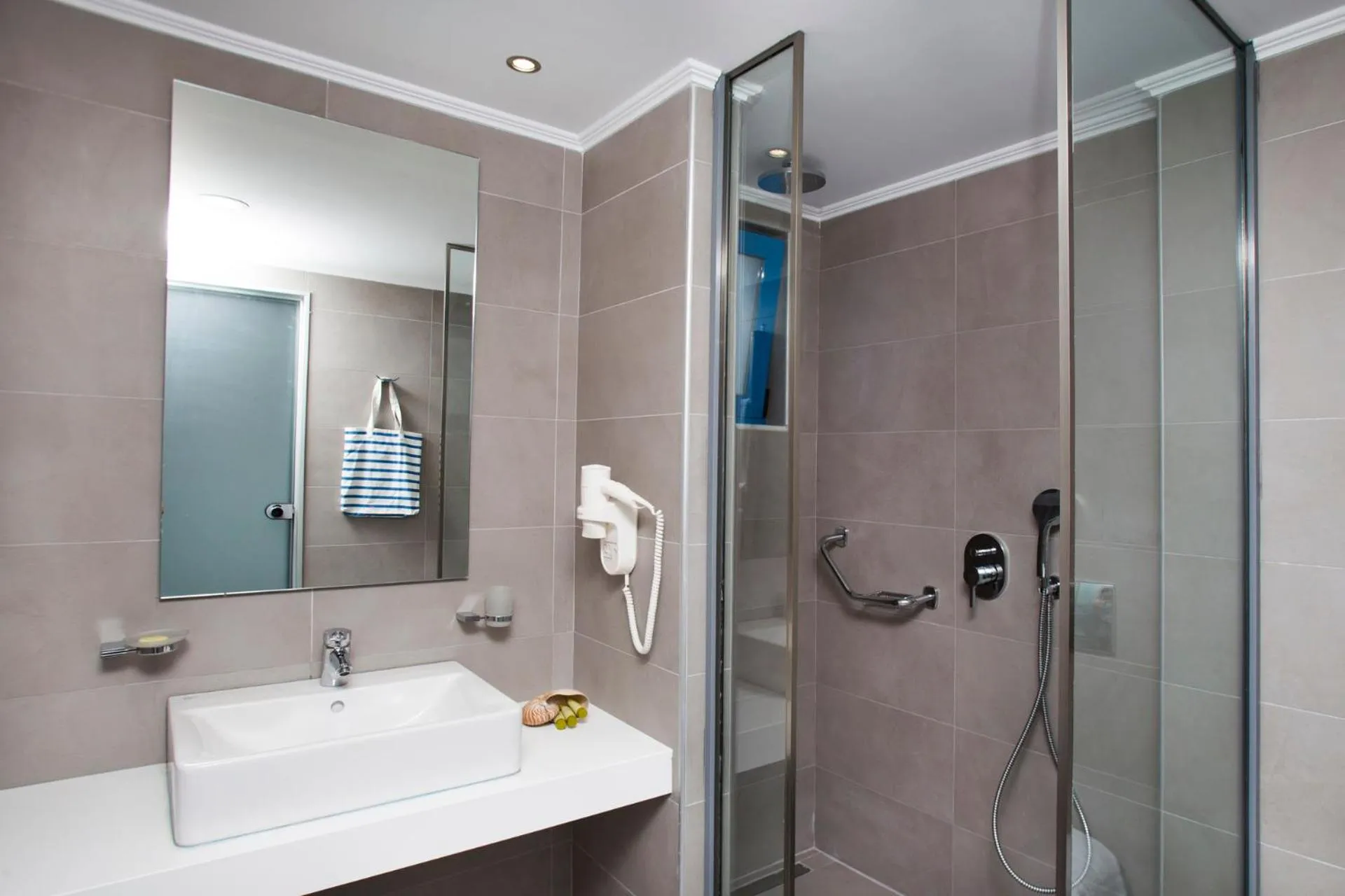 Bathroom in Lindos Portes Suites - Adults Only