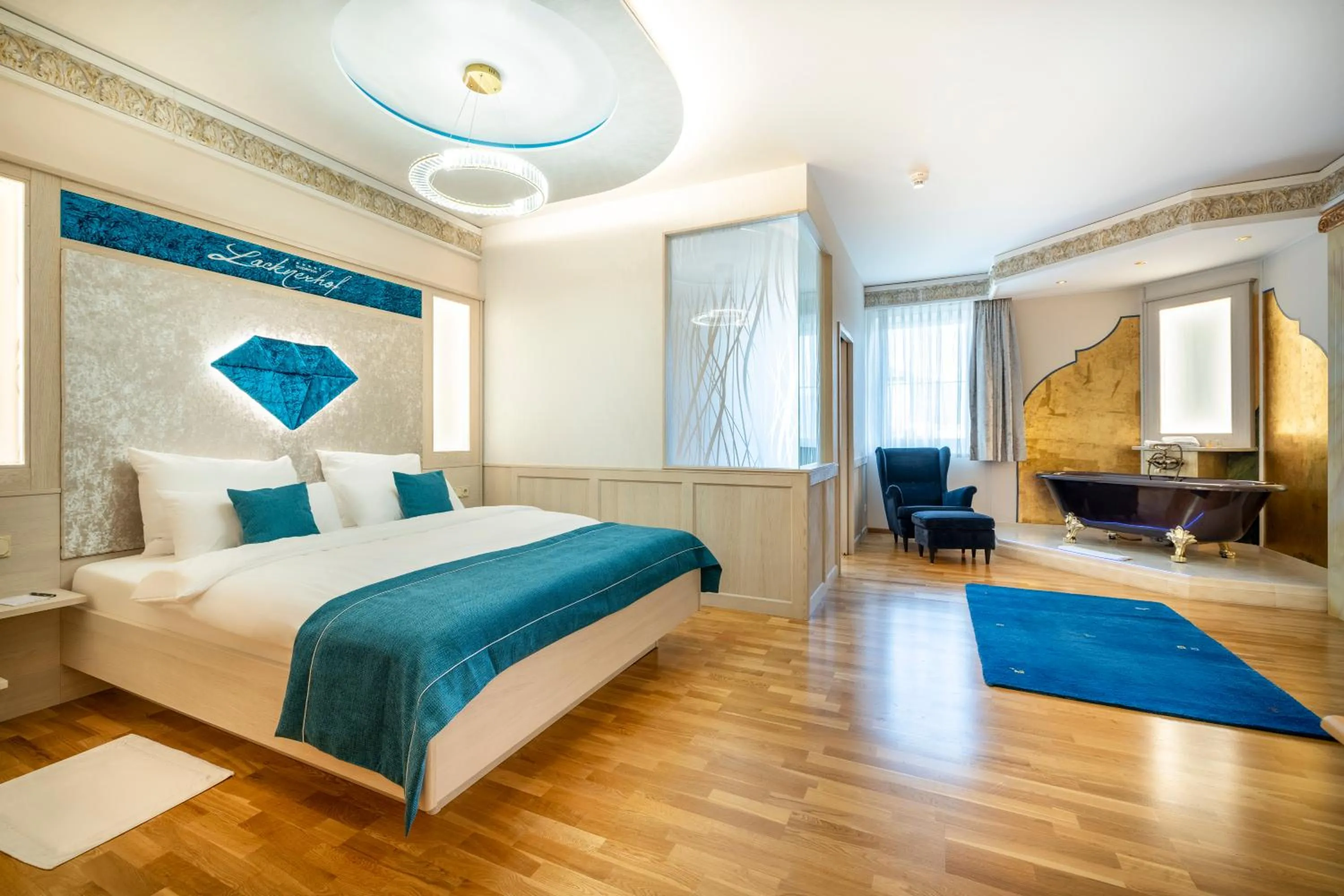 Photo of the whole room, Bed in Schlosshotel Lacknerhof