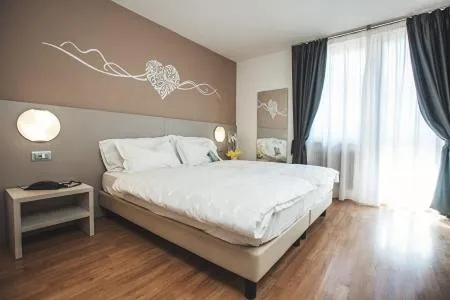 Bed in Hotel La Perla