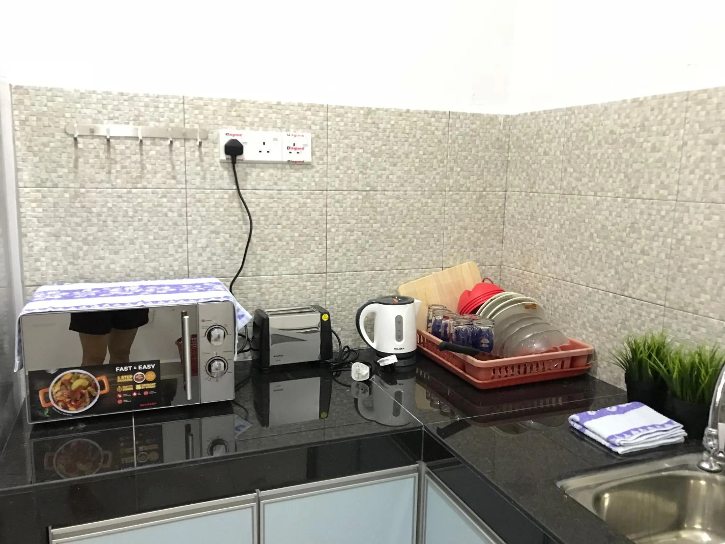 Kitchen or kitchenette in Jiaxin Homestay - JP Pedana 家馨民宿