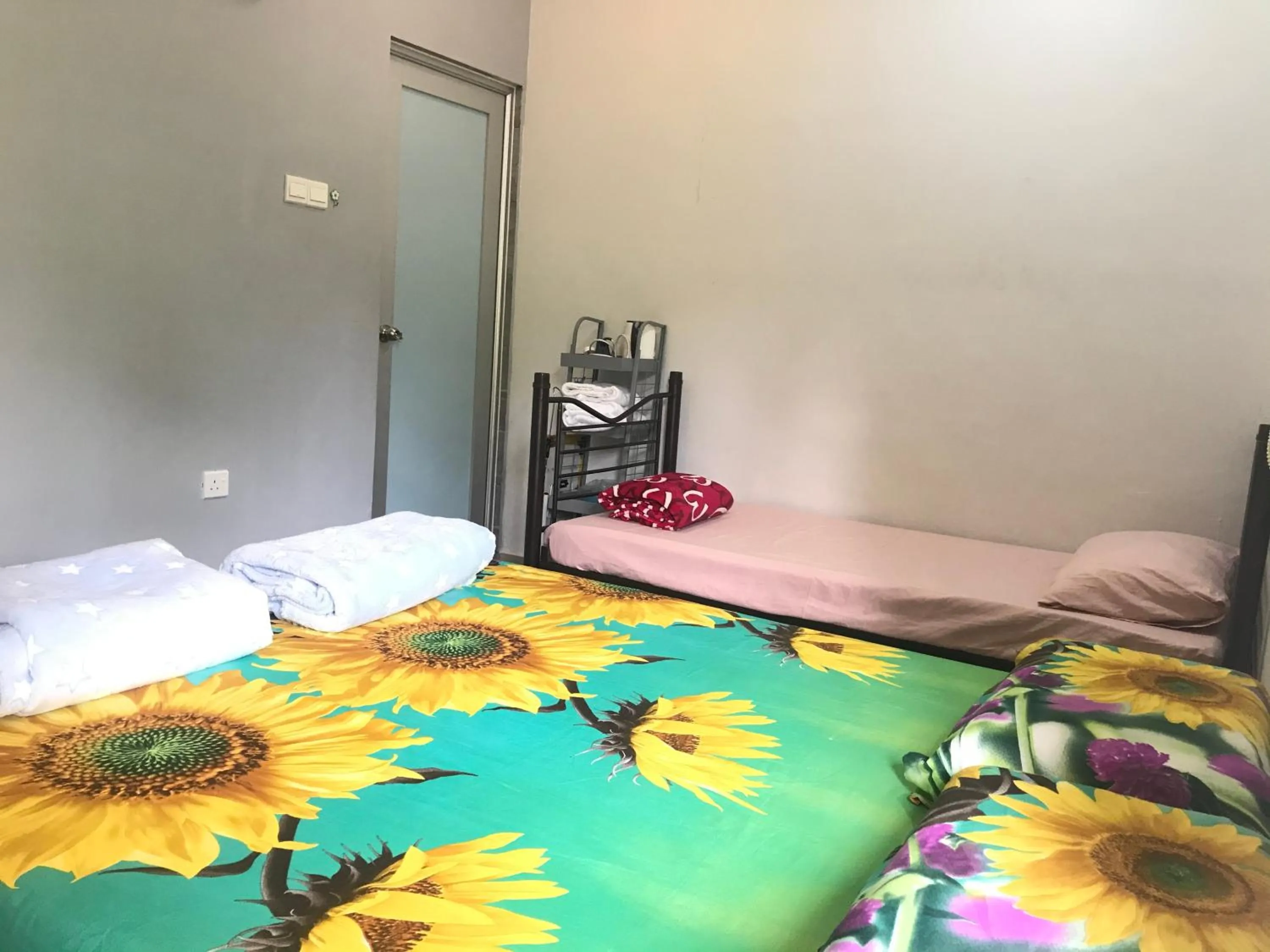 Bed in Jiaxin Homestay - JP Pedana 家馨民宿